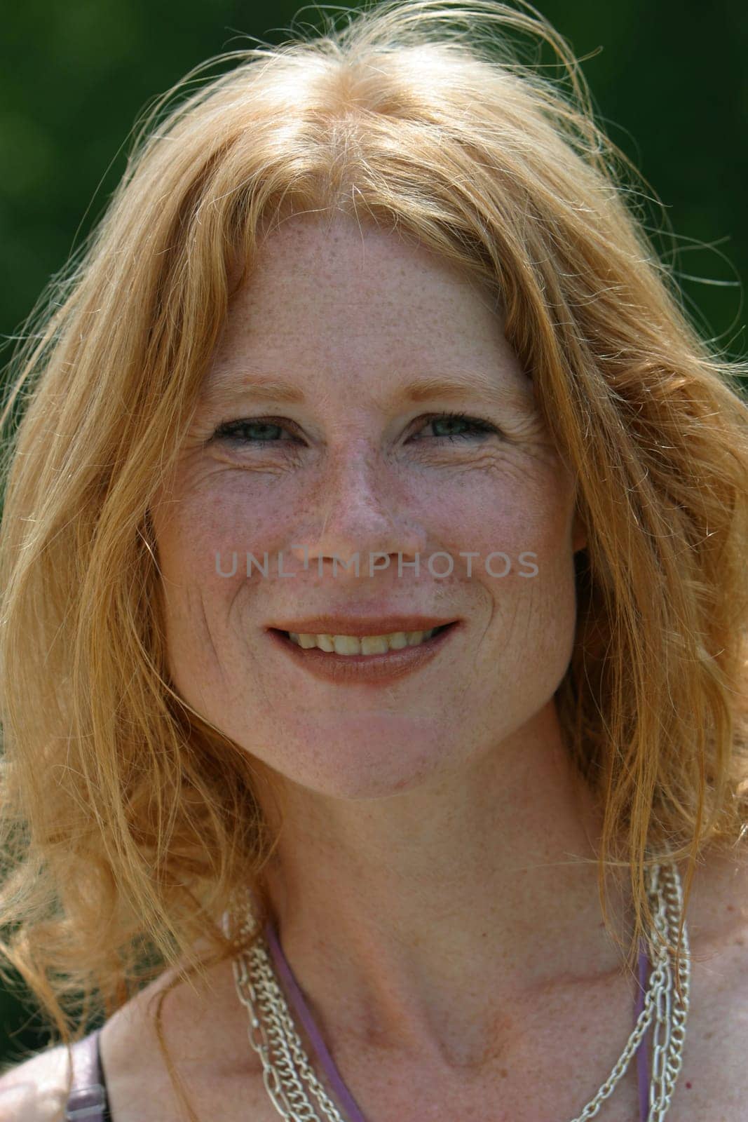 red-haired woman over 40