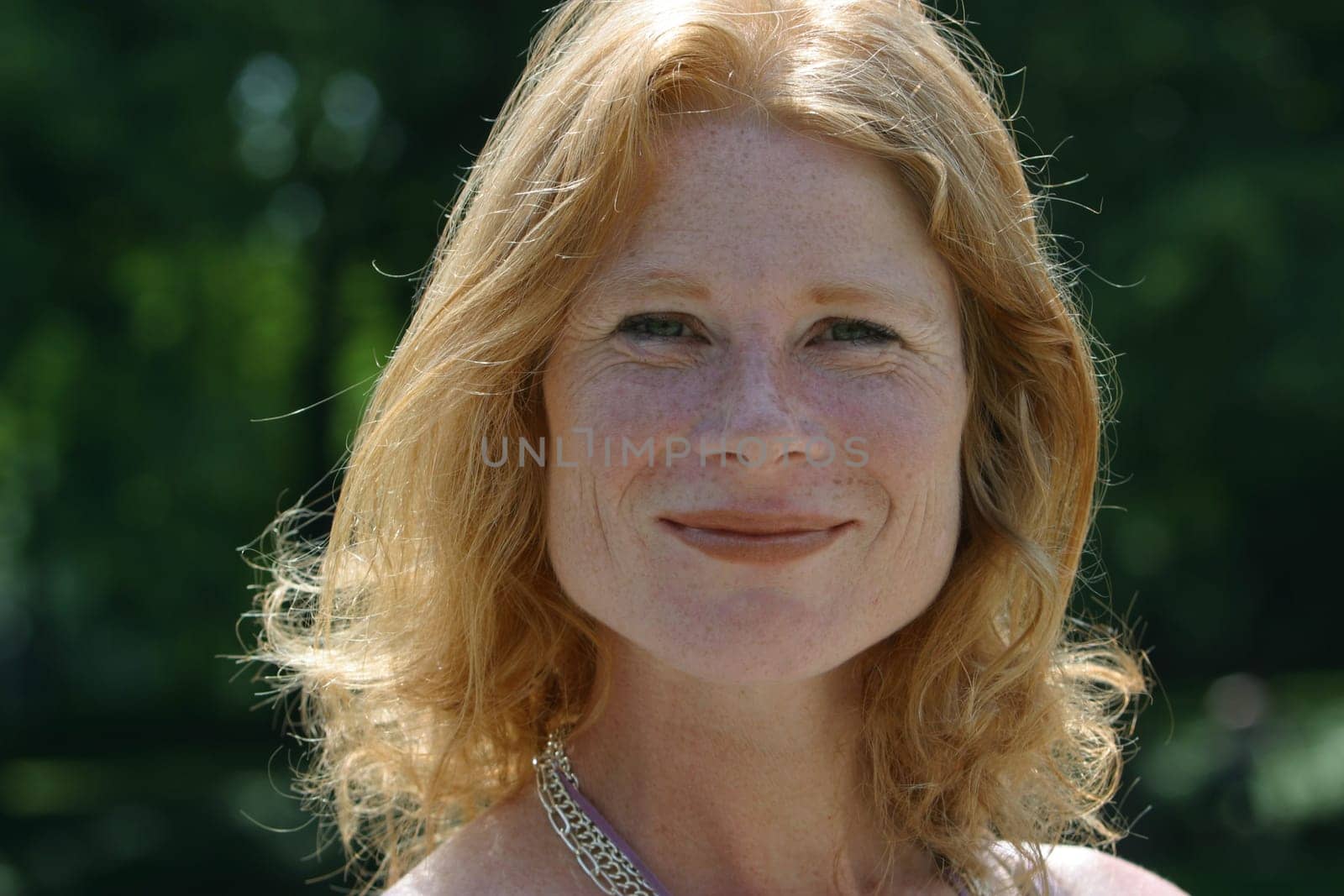 red-haired woman over 40