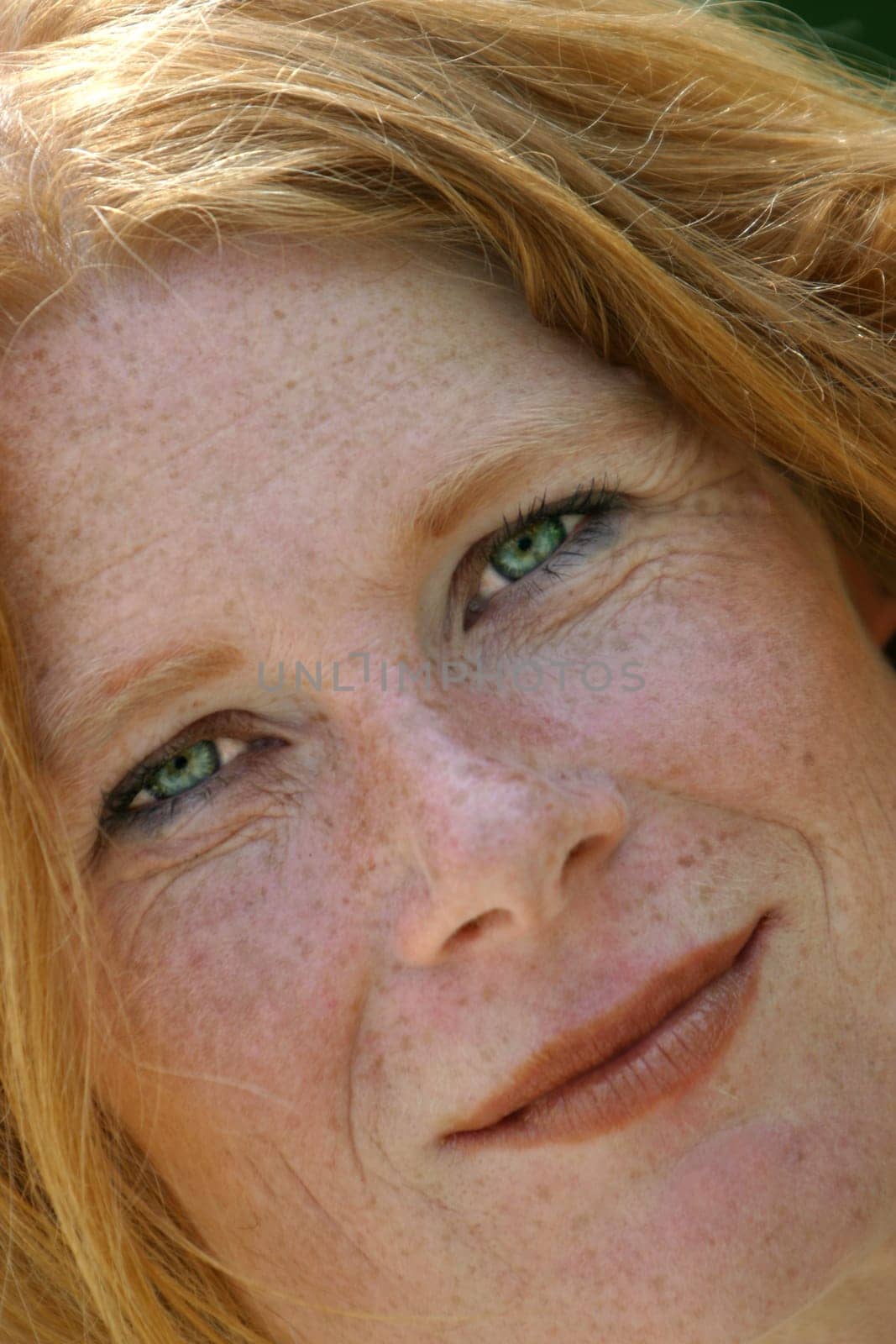 red-haired woman over 40