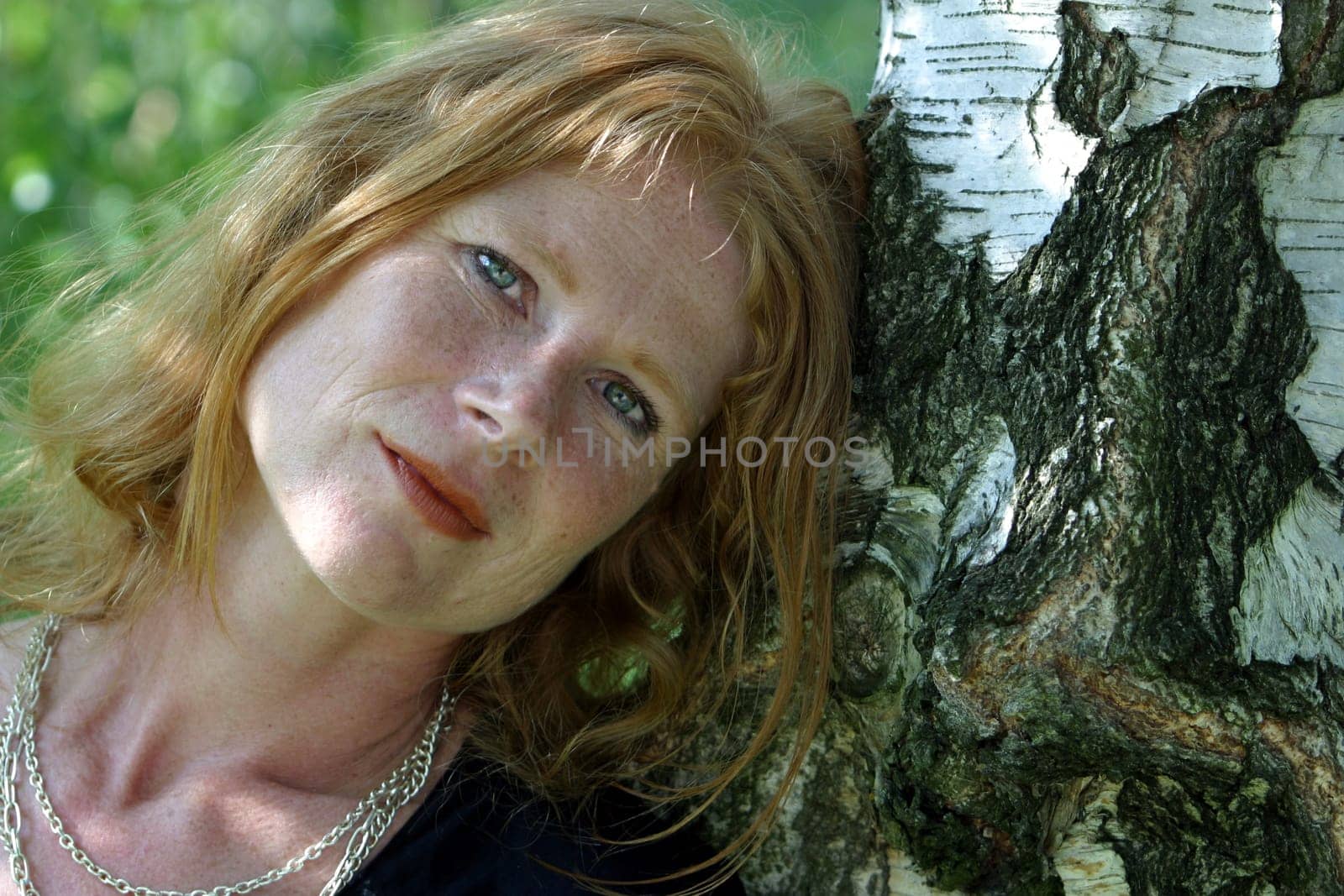 red-haired woman over 40