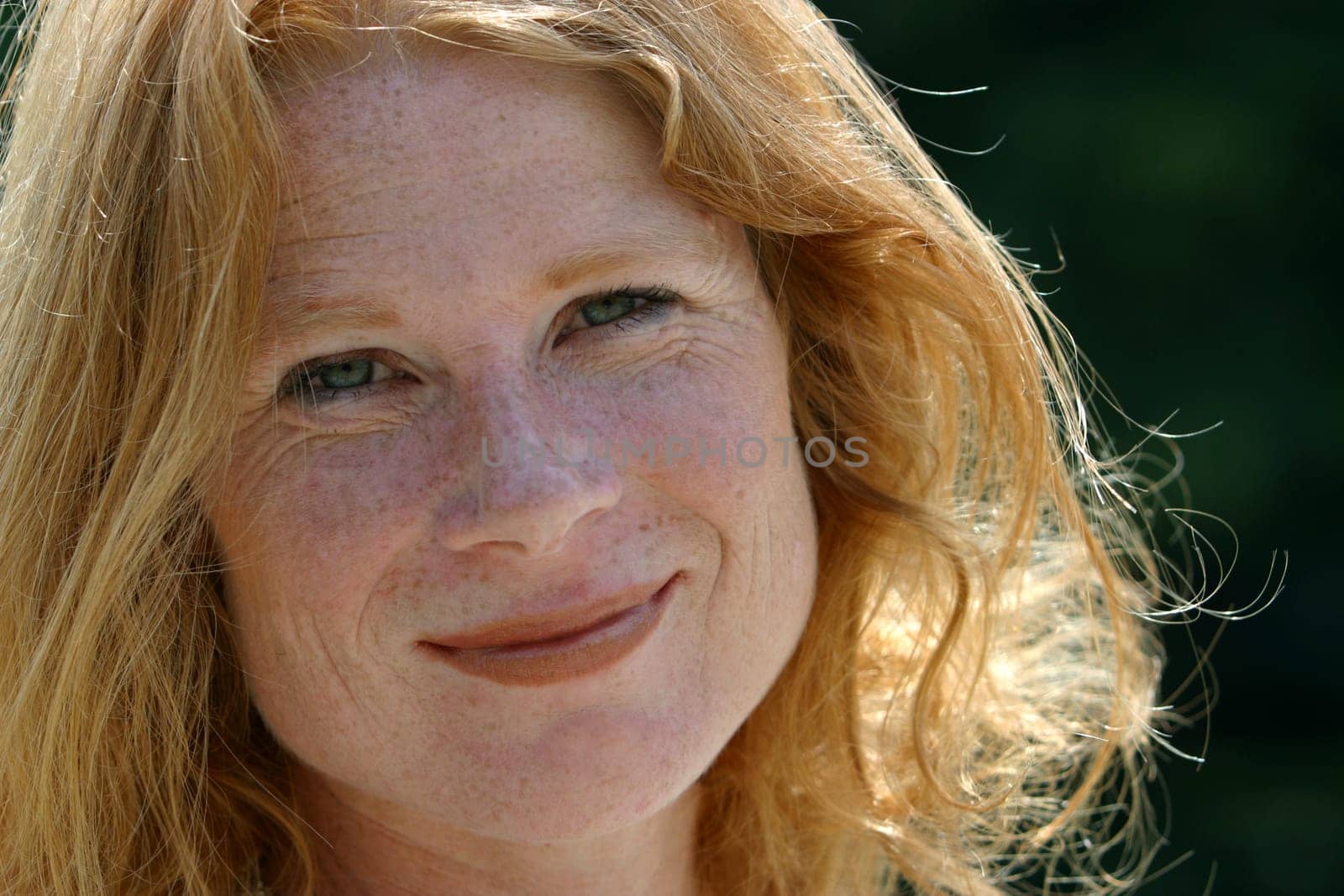 red-haired woman over 40