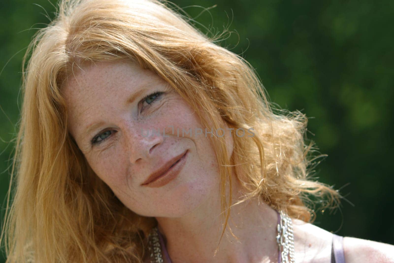 red-haired woman over 40