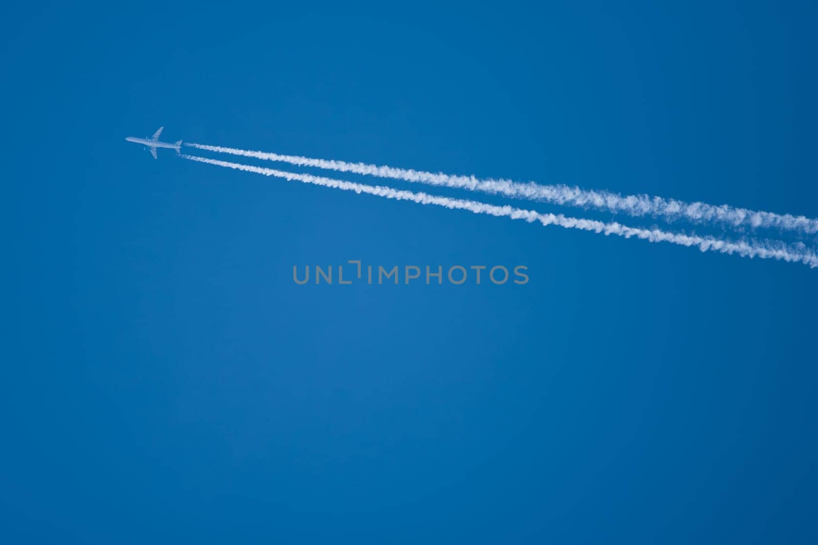 Airplane in the blue sky