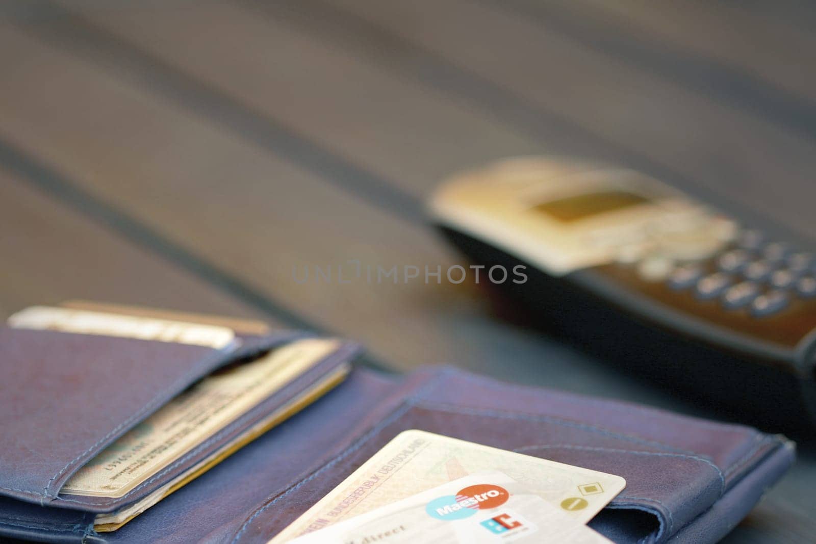 Wallet with telephone and debit card
