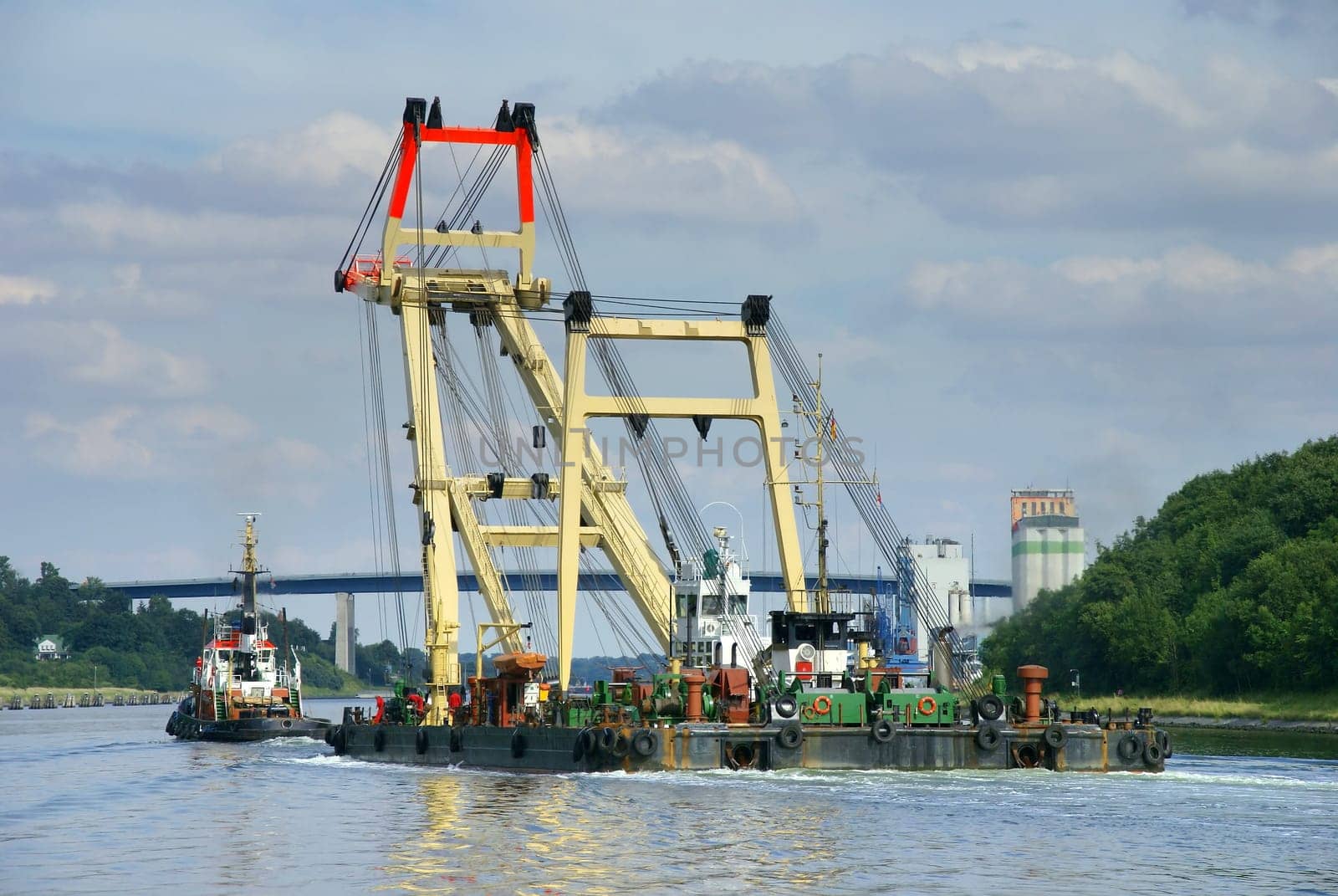with tugboat through the Kiel Canal