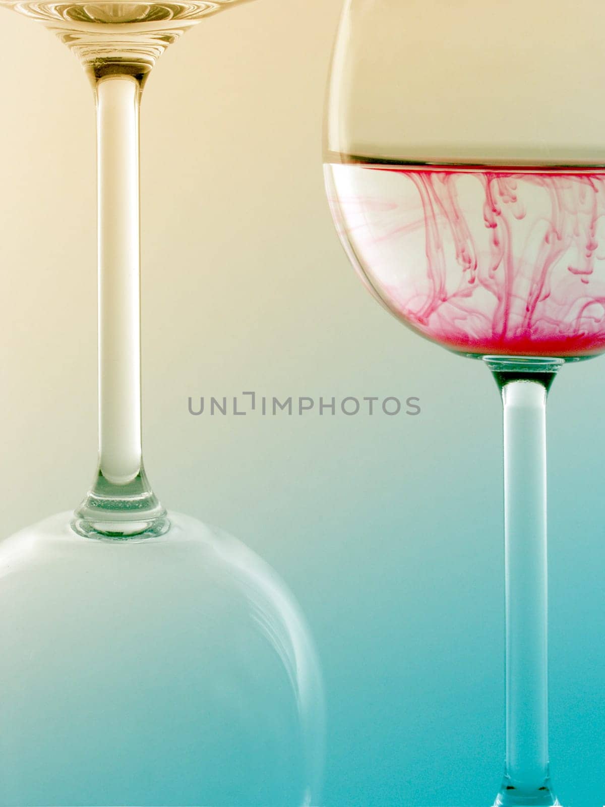Two red wine glasses in portrait format