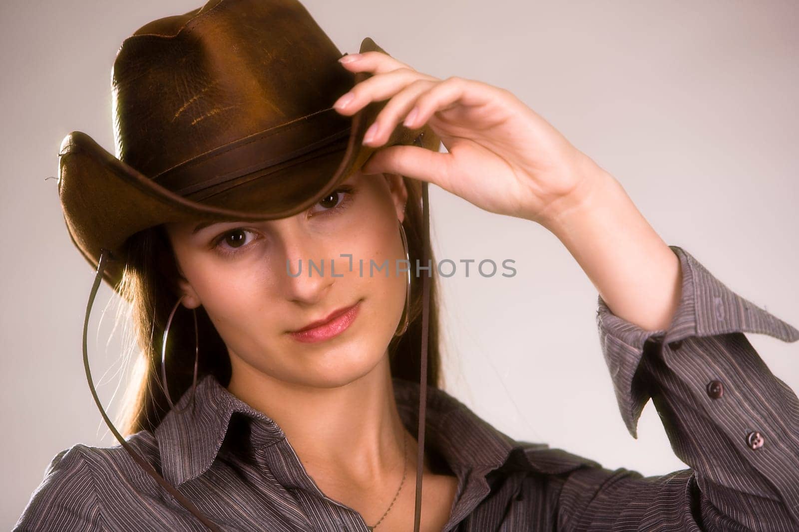 Woman with cowboy hat
