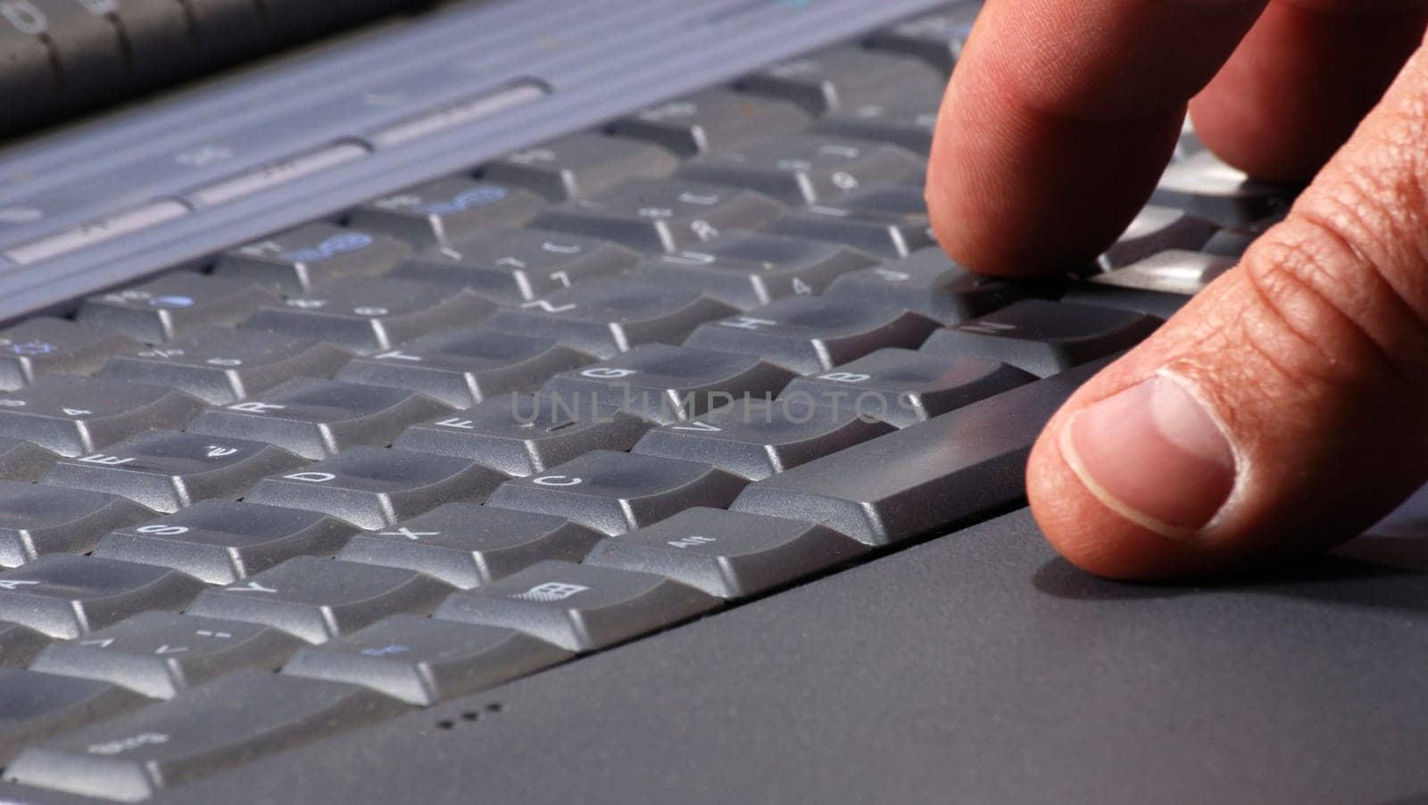Thumb on keyboard