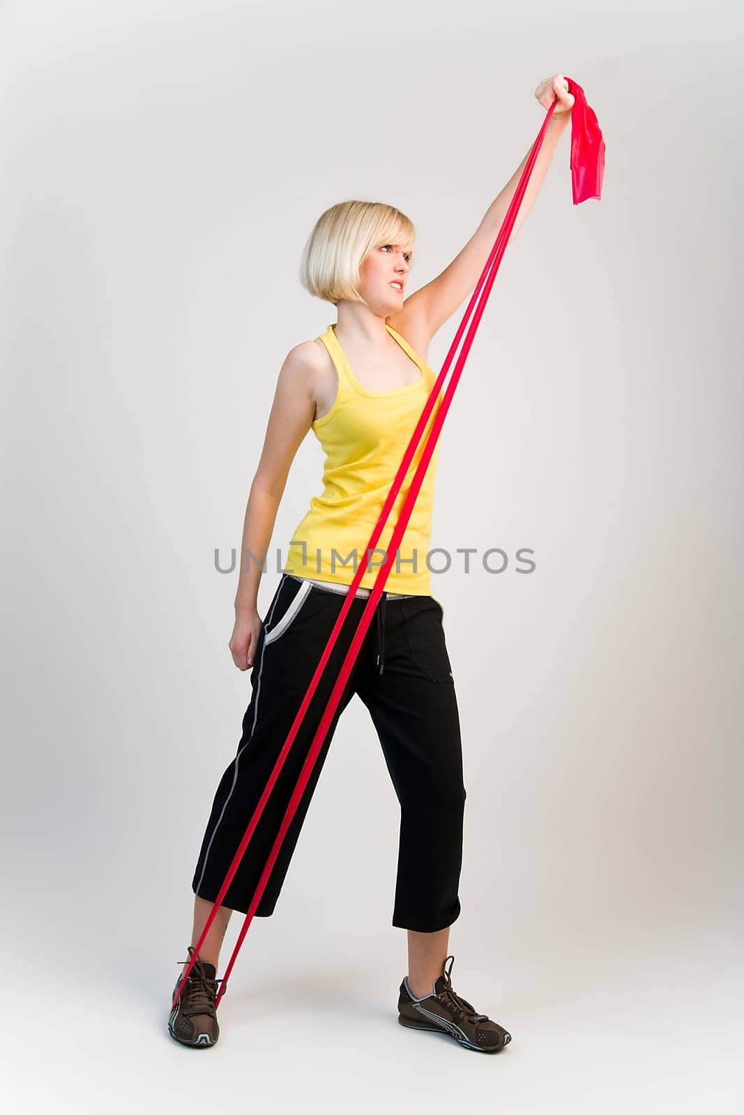 Woman exercising with ribbon