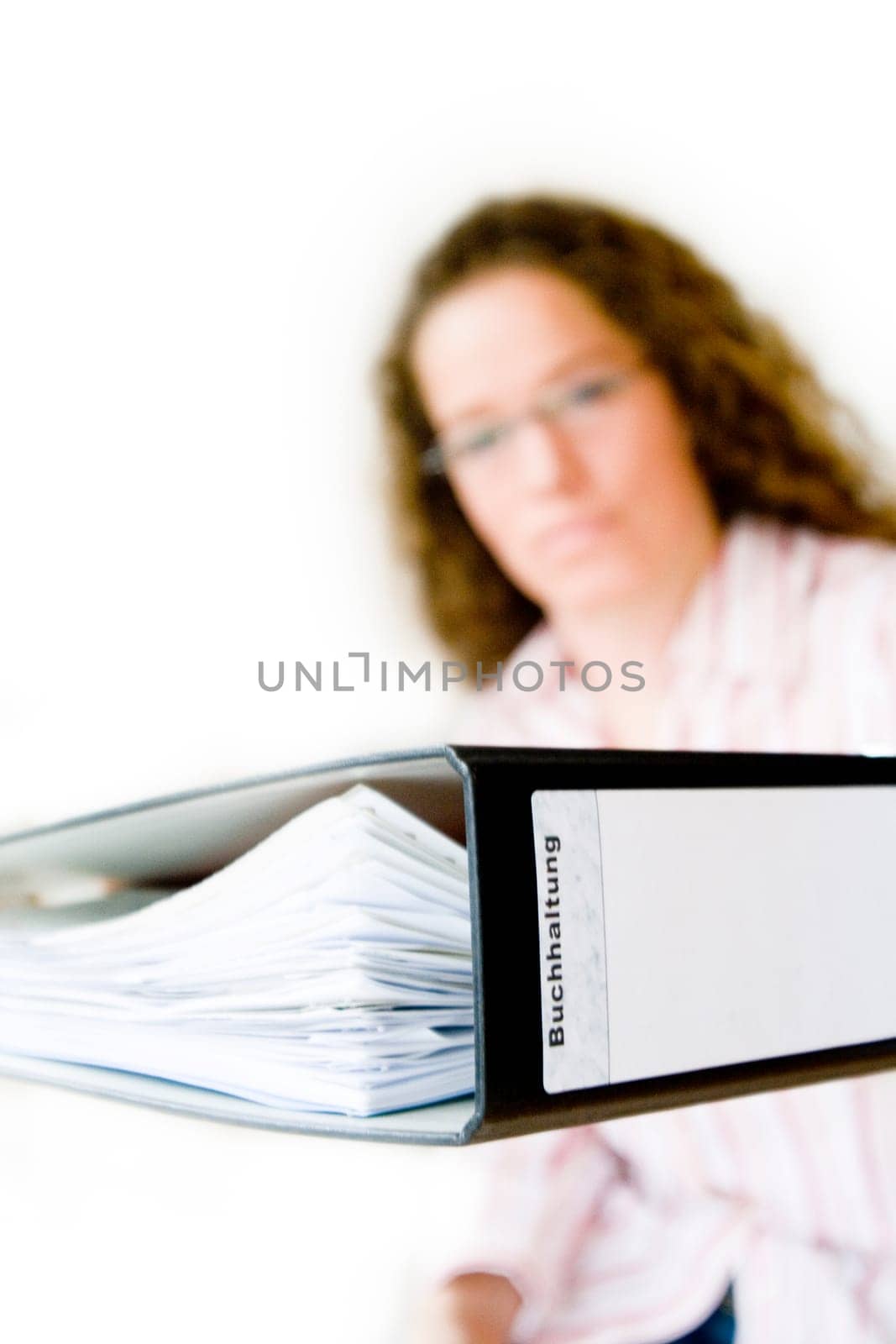 Woman hands over folder