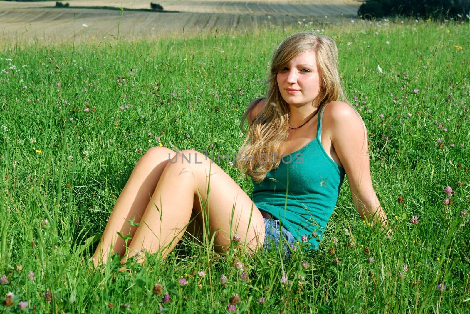 Young woman in the grass