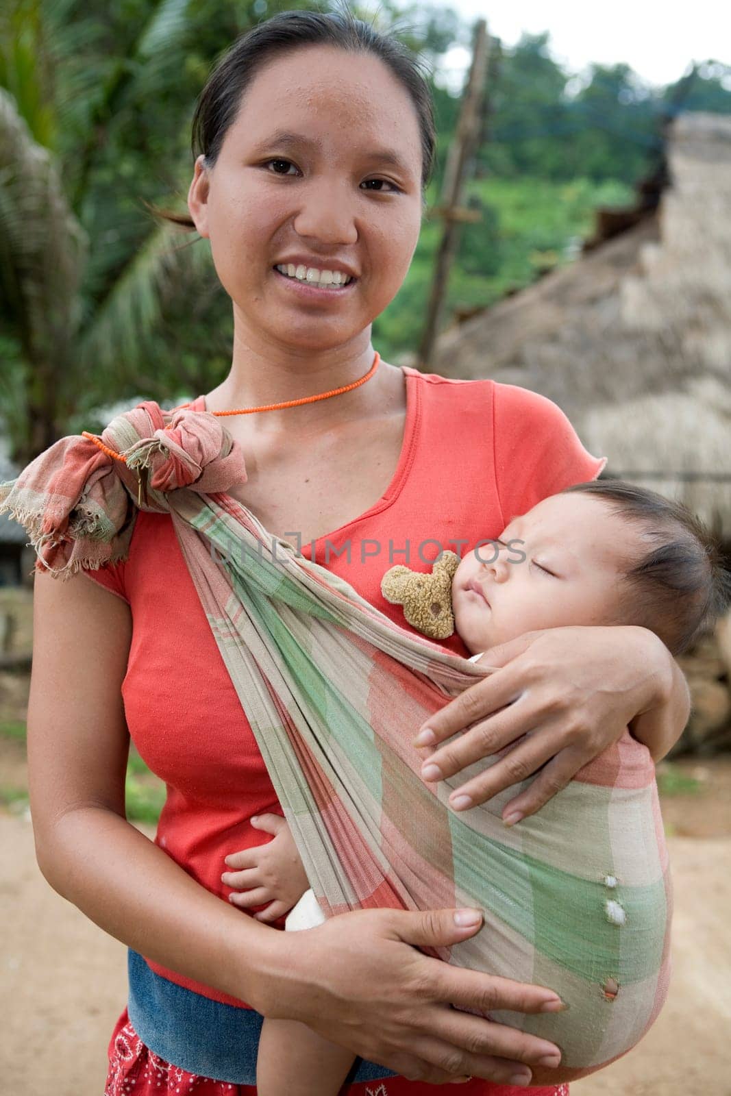 Akha woman with child