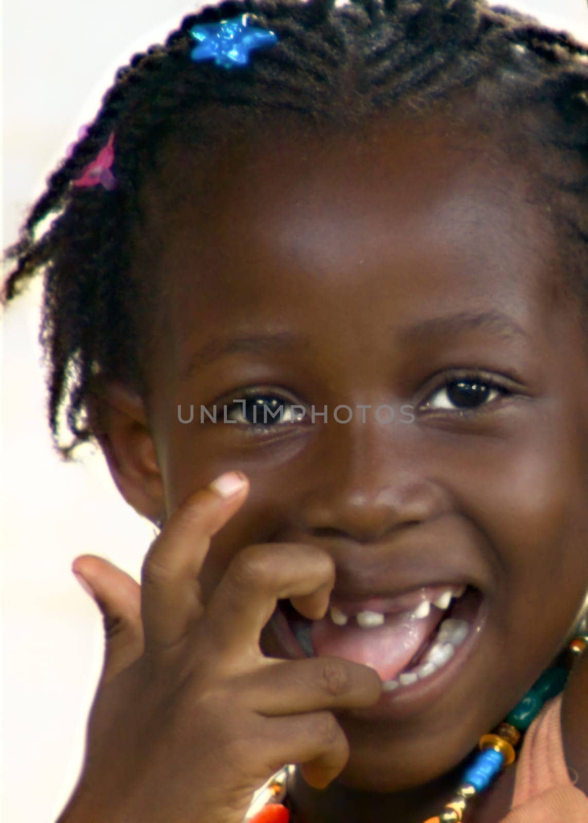 she makes fun of the photographer who keeps trying to capture this whirlwind photographically,a difficult undertaking,that's why motion blur is involved...