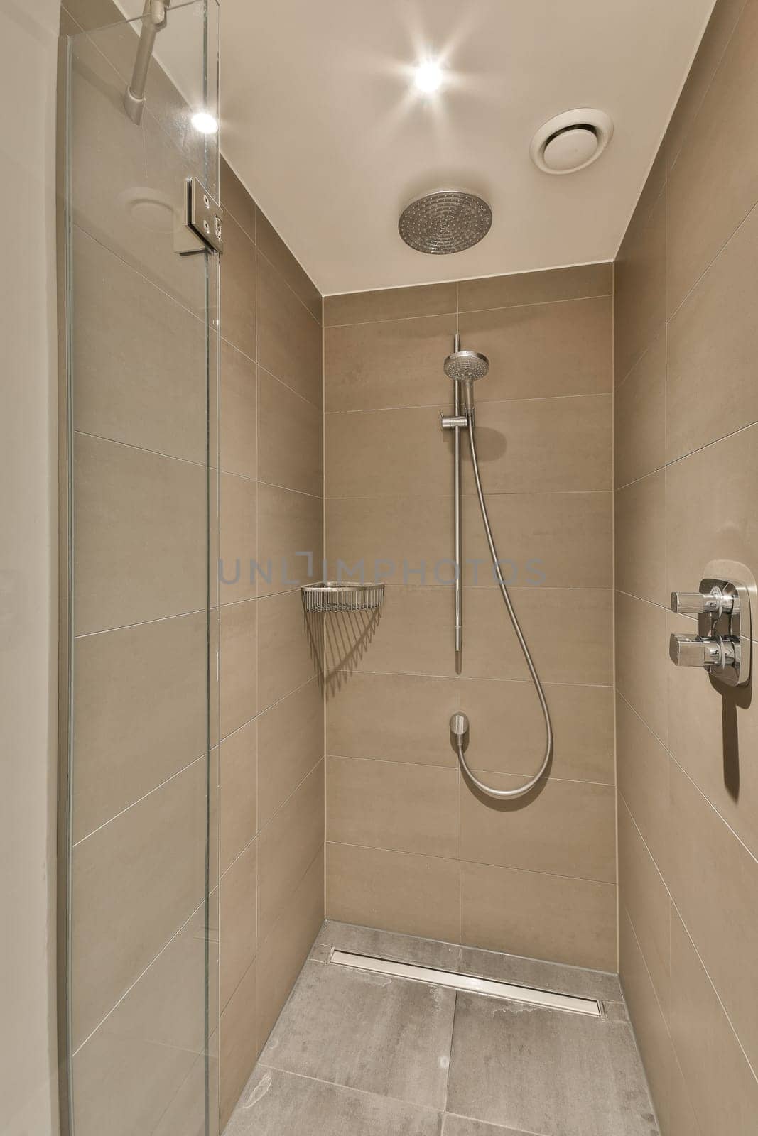 a walk in shower that is very clean and ready to be used for the bathroom reurrectionment