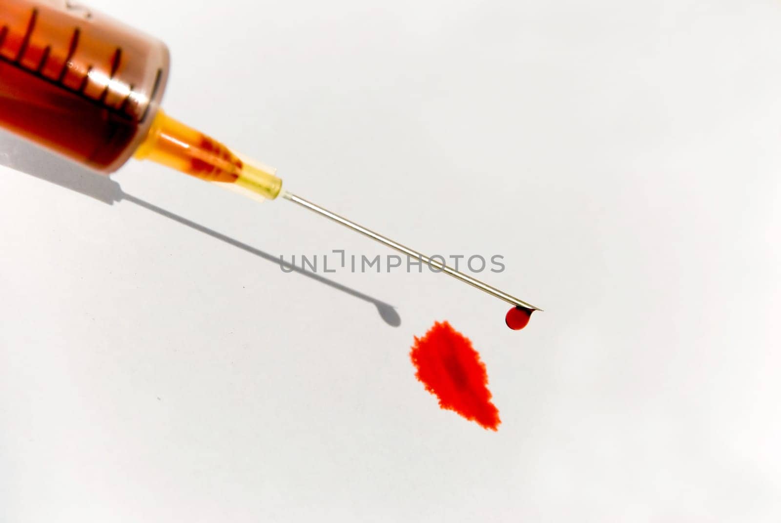 Syringe with blood