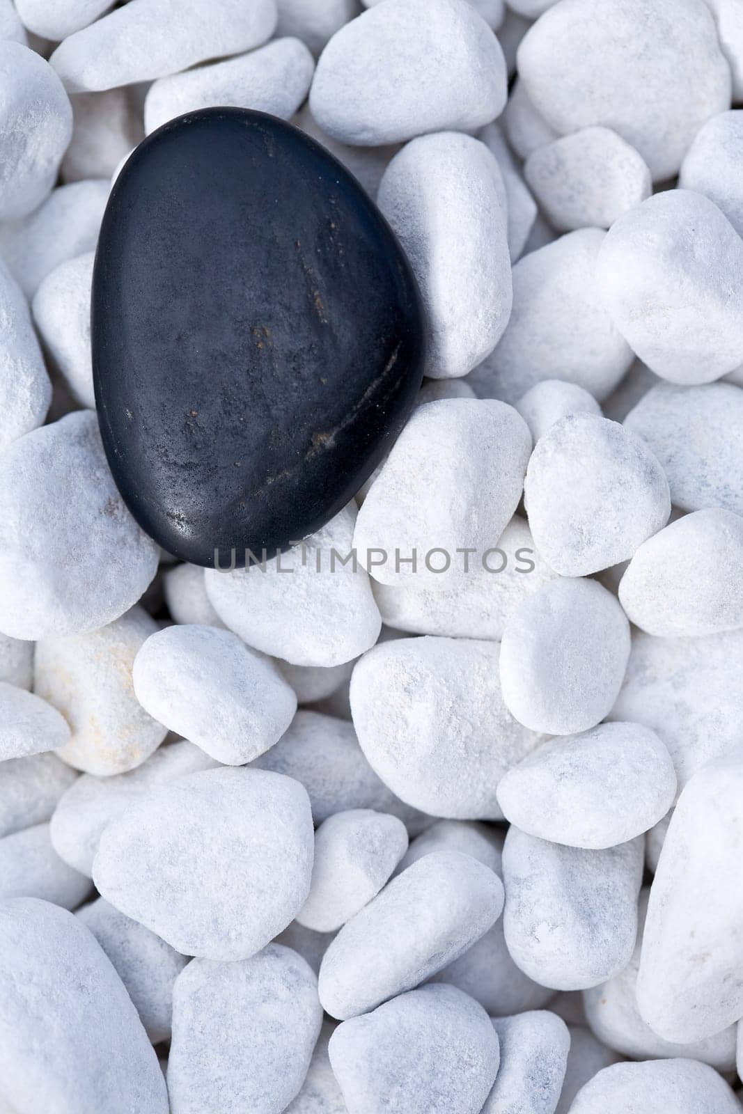Zen stone on ornamental pebbles