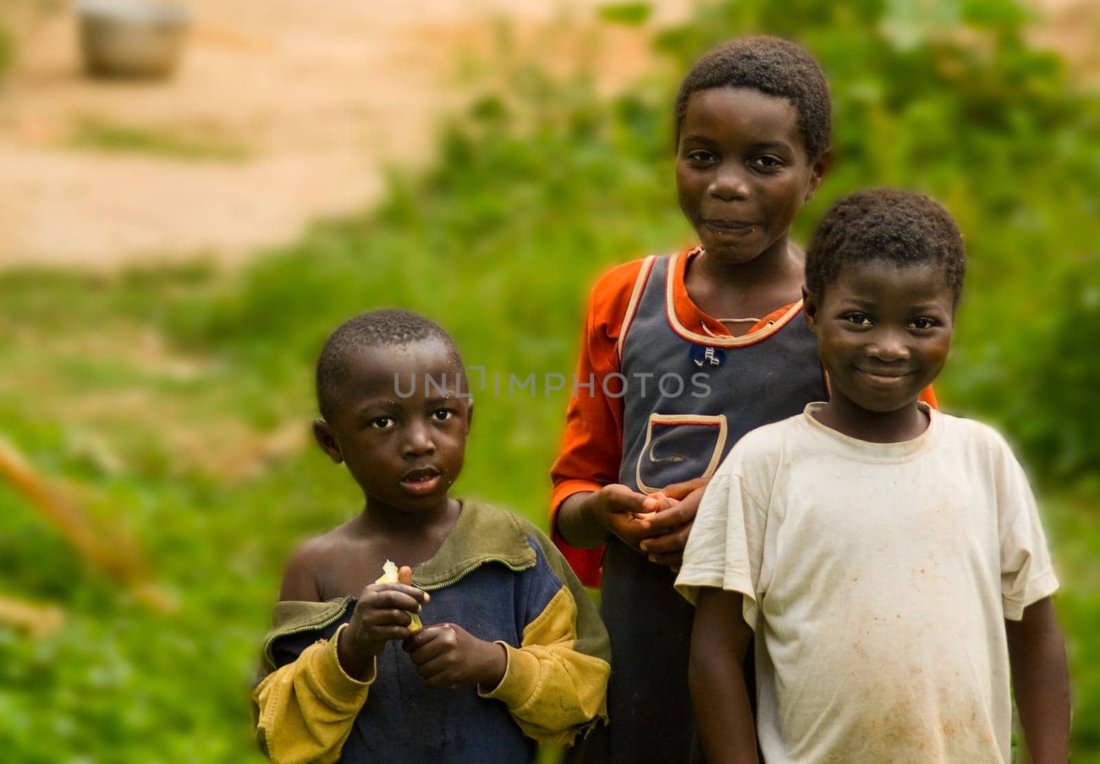 the trio Nnanga,a strong trio of siblings,sorry,they just ate,I didn't put their make-up or powder,I didn't even wash their faces. They are what they are,children from Ngobelen,a village in the south of Cameroon,very close to the equator,ga