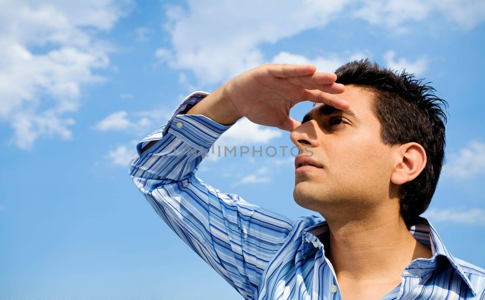Guy looking up to the sky
