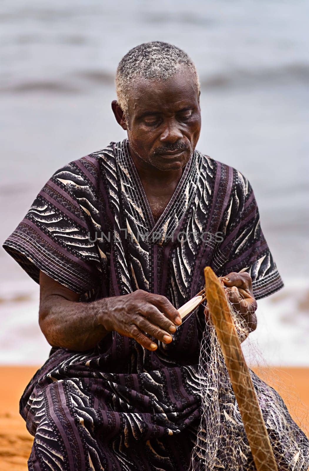 Again a picture of Herman the fisherman and net repairer,I find his concentration in his work particularly beautiful. It wasn't easy to get that,he wanted to pose in the usual way at first: No,I told him to be quiet