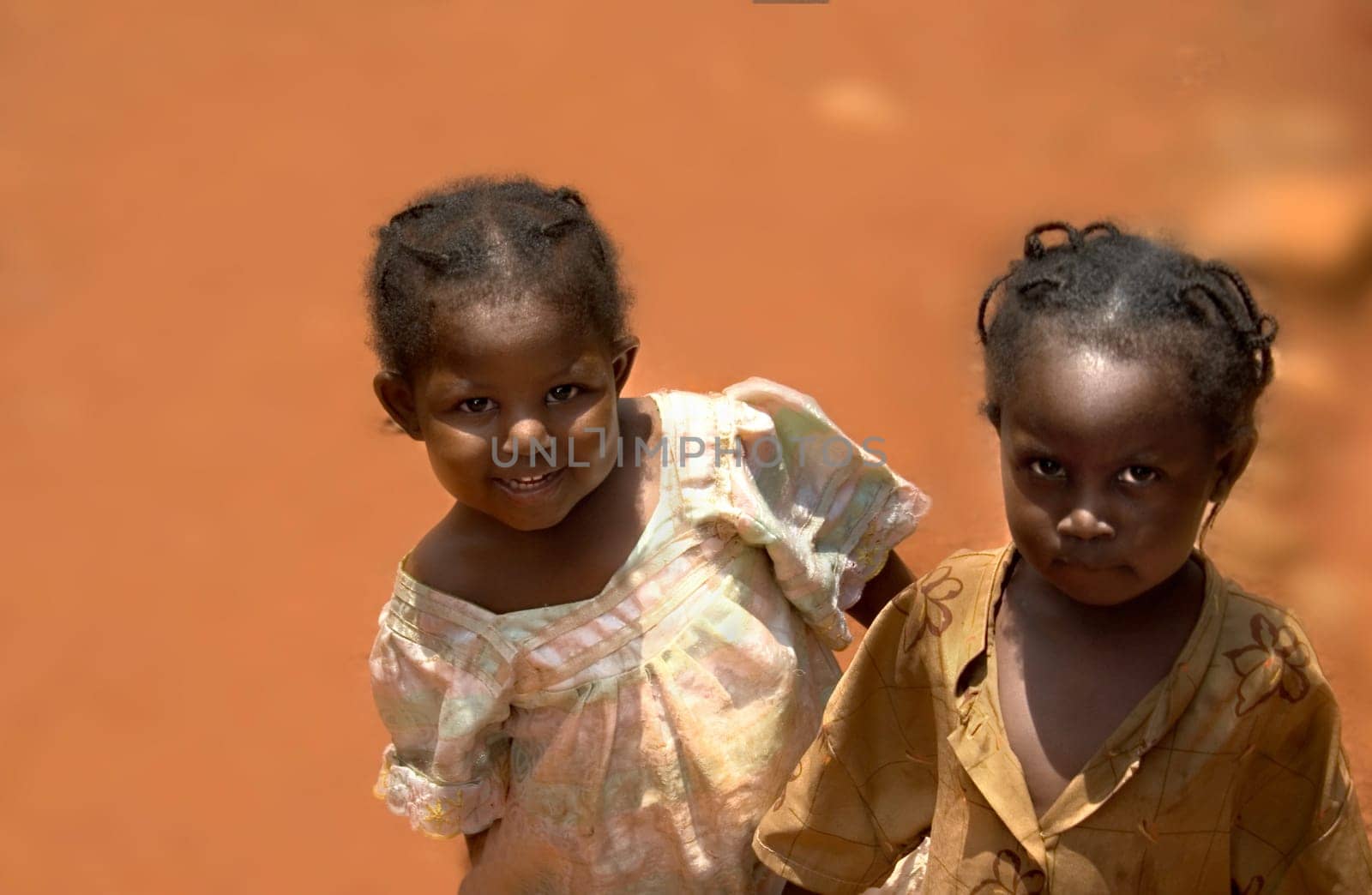... full in the sun I photographed the two adorable girls. They were published in b/w with a slight modification. See my series Kids and Co.