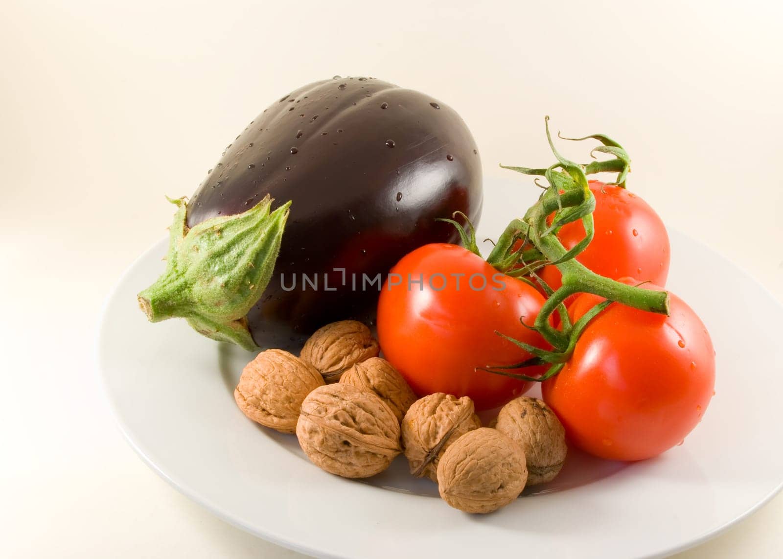 Tomatoes and aubergine - isolated