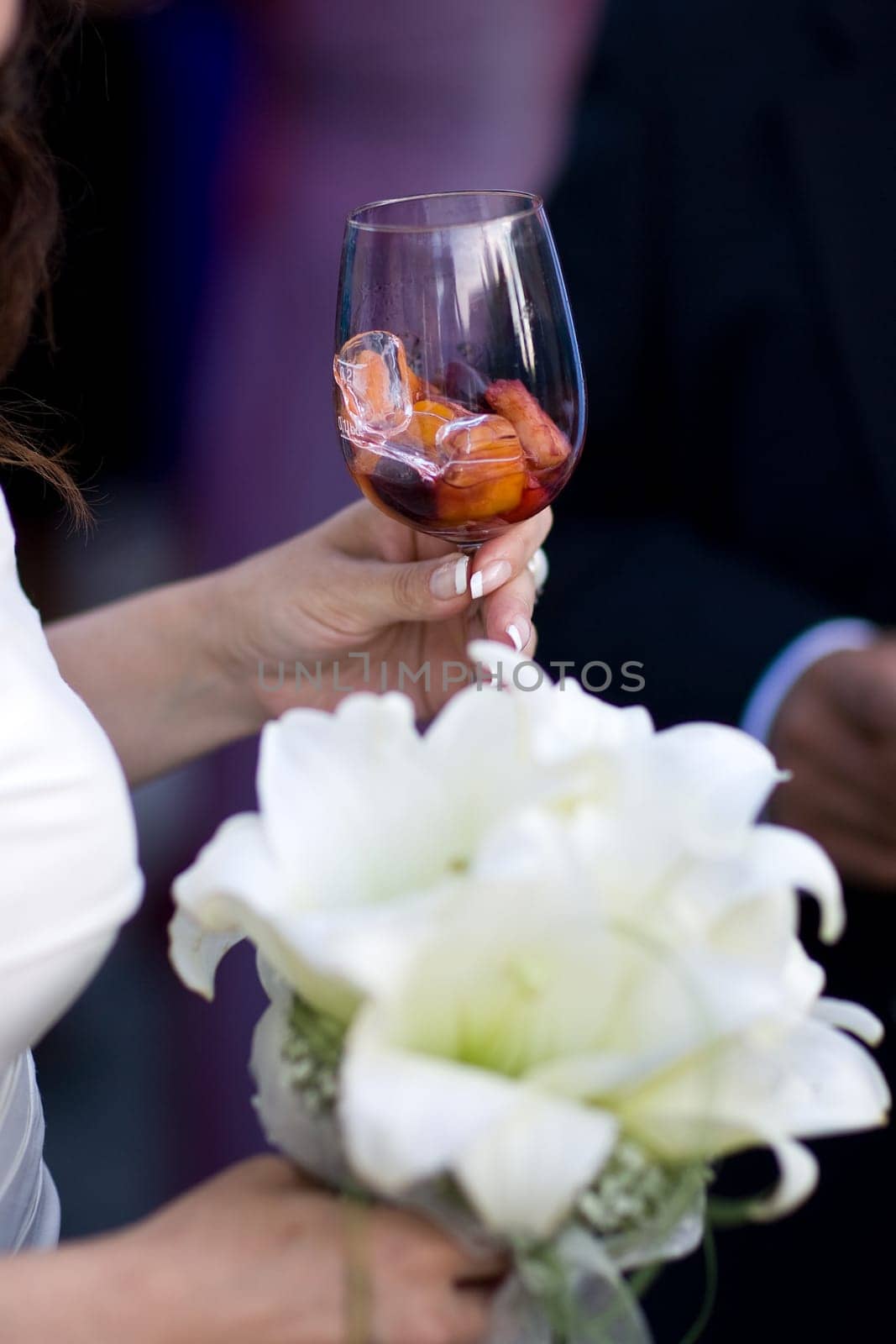 Bride holding glass