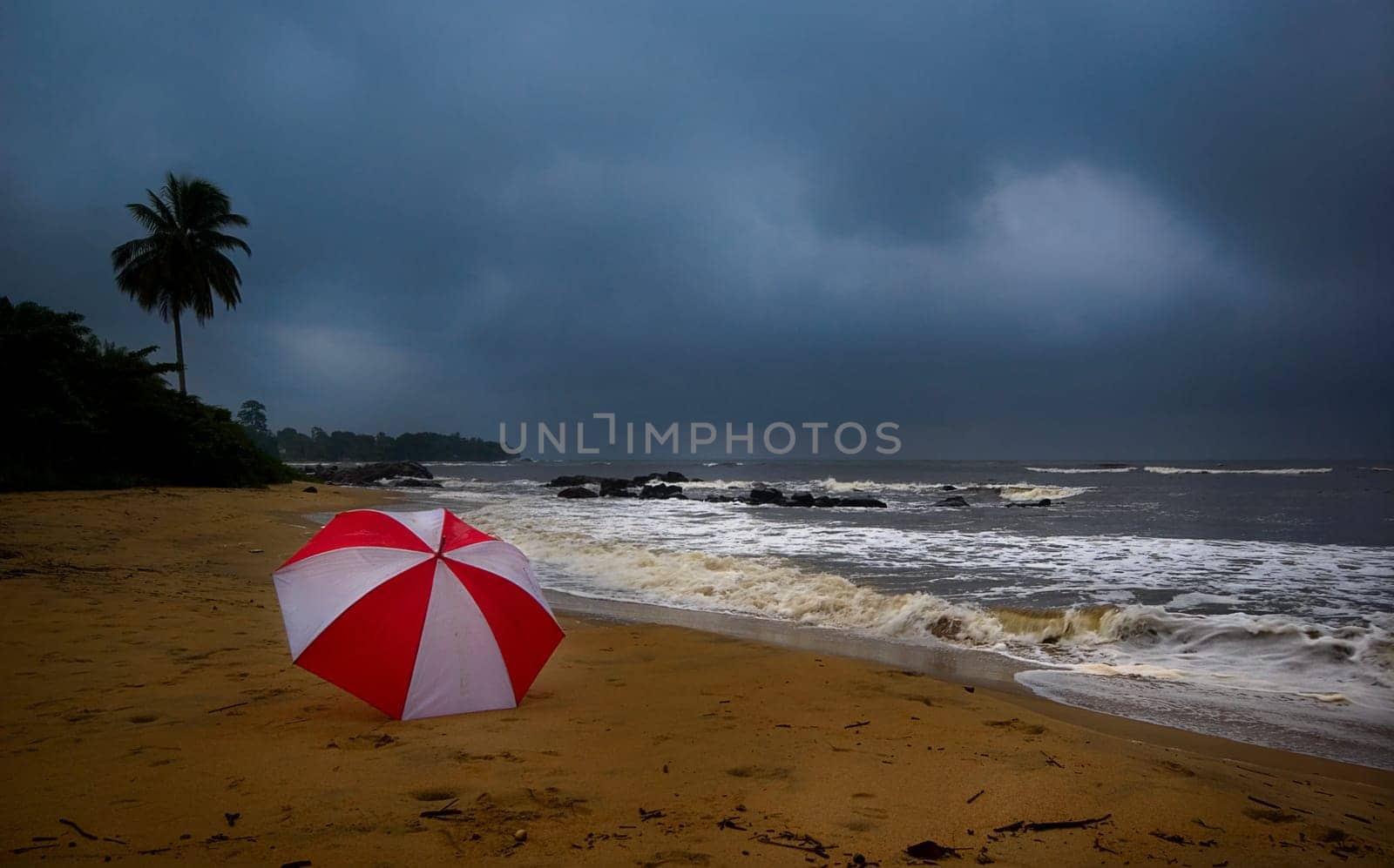 I know the idea with the umbrella is not new and not particularly original. However,I came to this photo almost involuntarily. When I was taking pictures on the beach in the rain and my camera was protecting my umbrella from the rain,the wind tore my sword