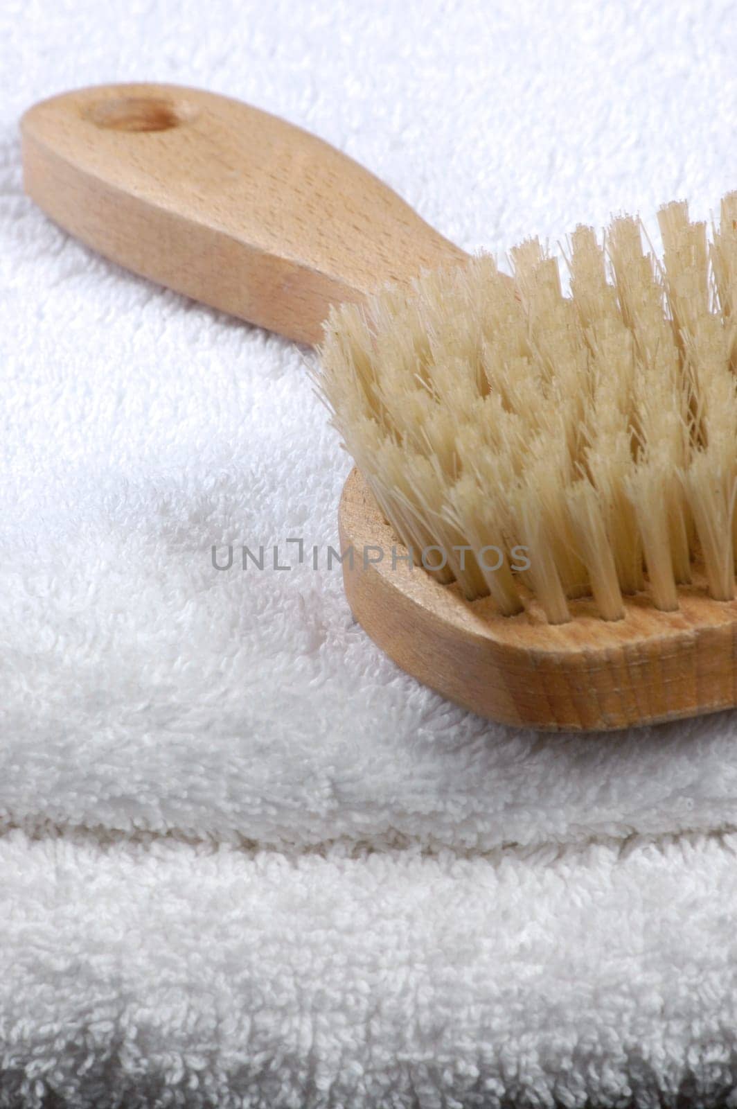 Sauna brush on towels