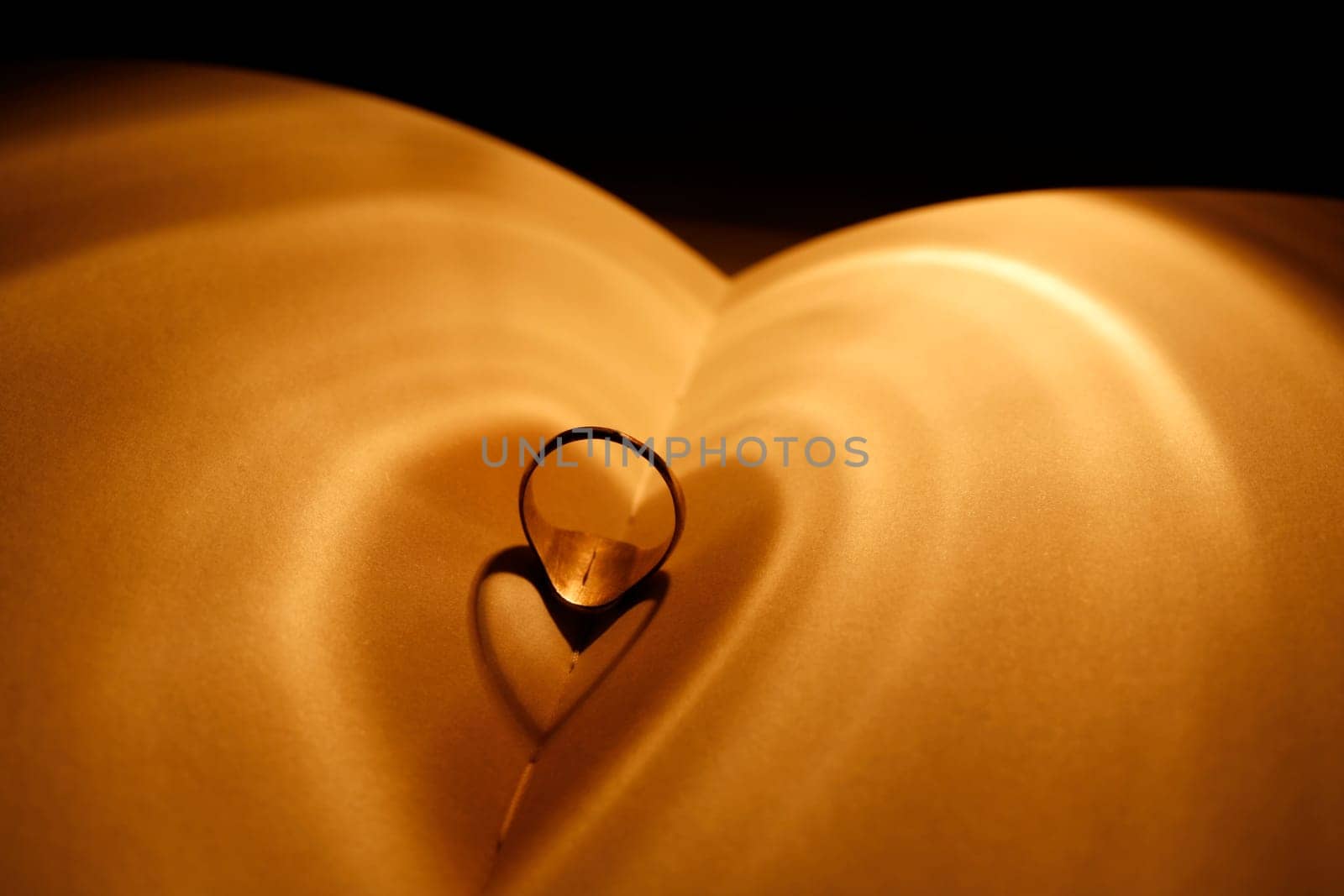 Ring forms a heart in the light