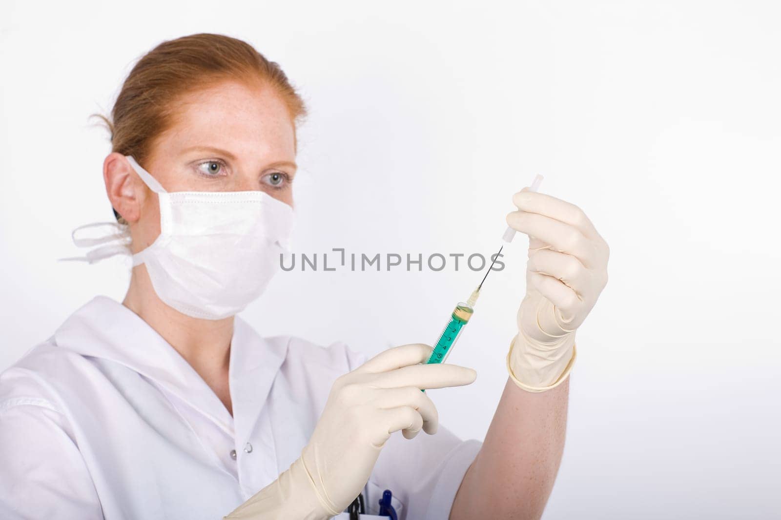 Remove the protective cap from the syringe