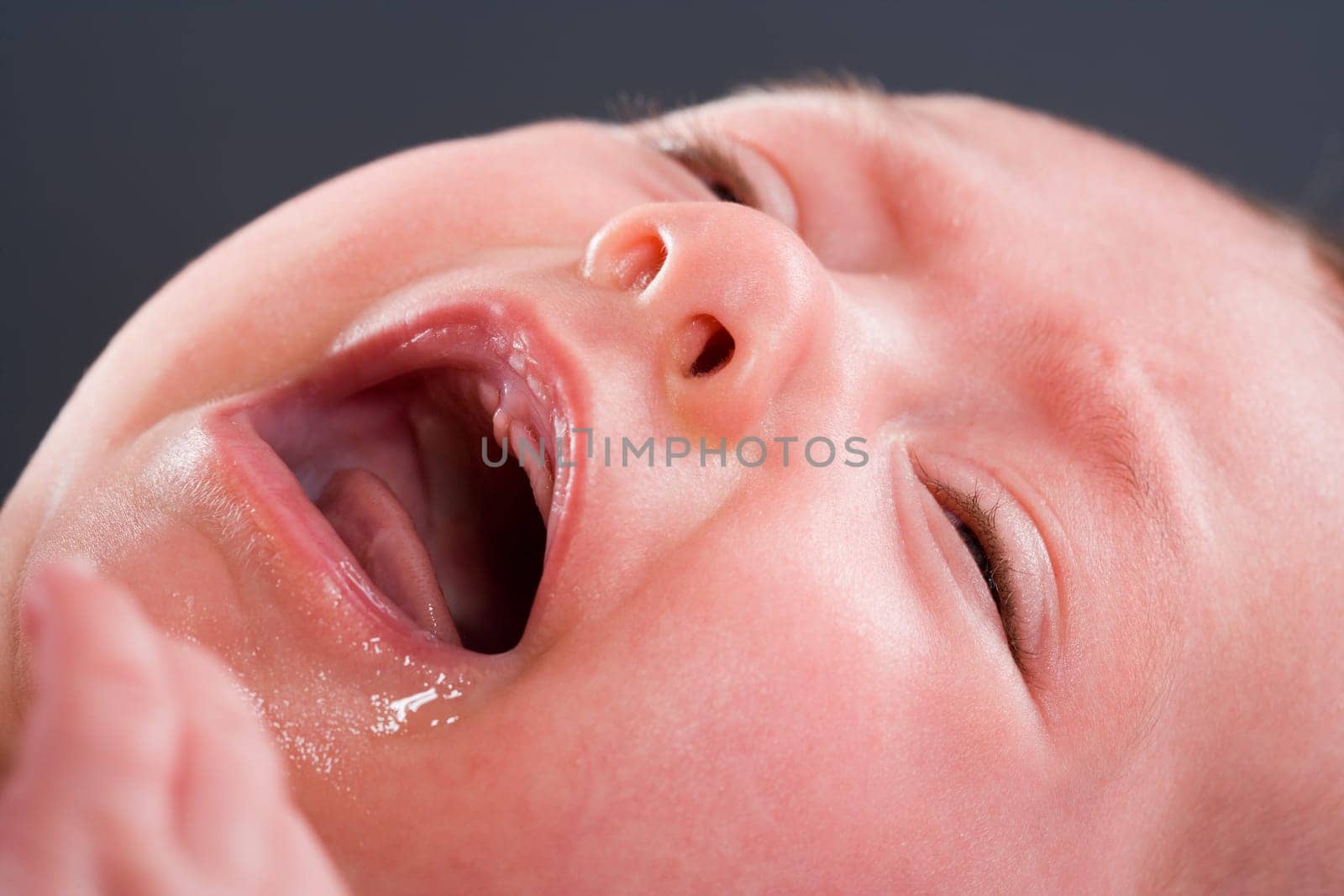Baby cries close-up