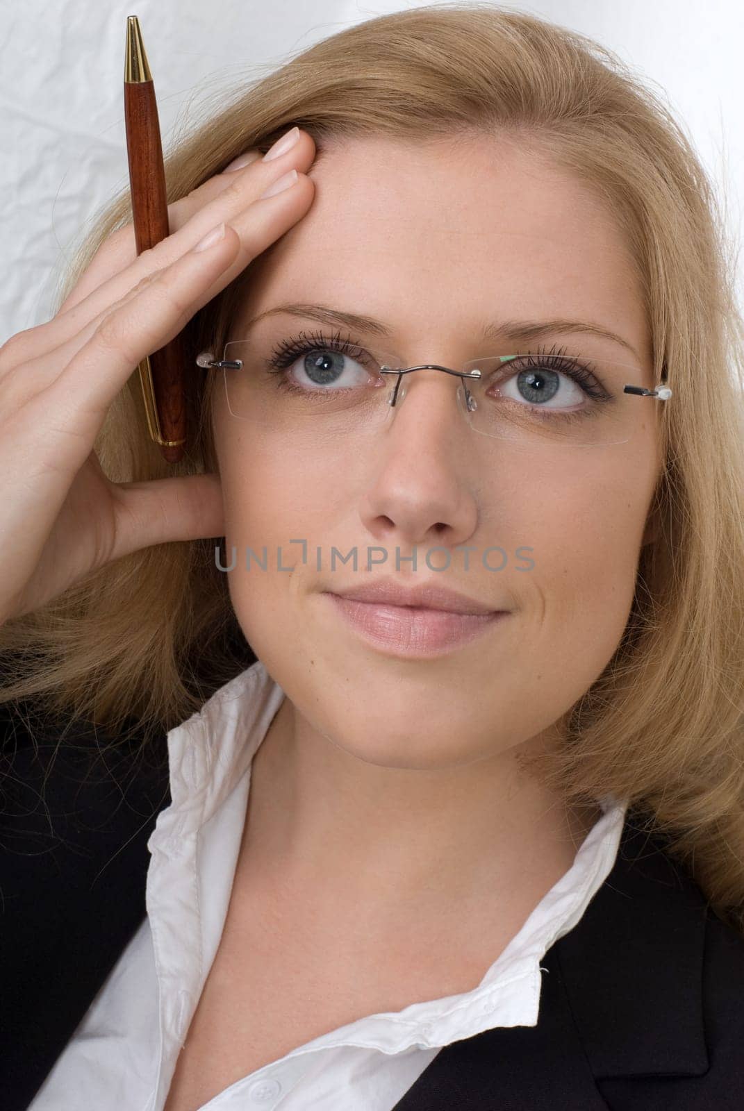 Young woman with pen