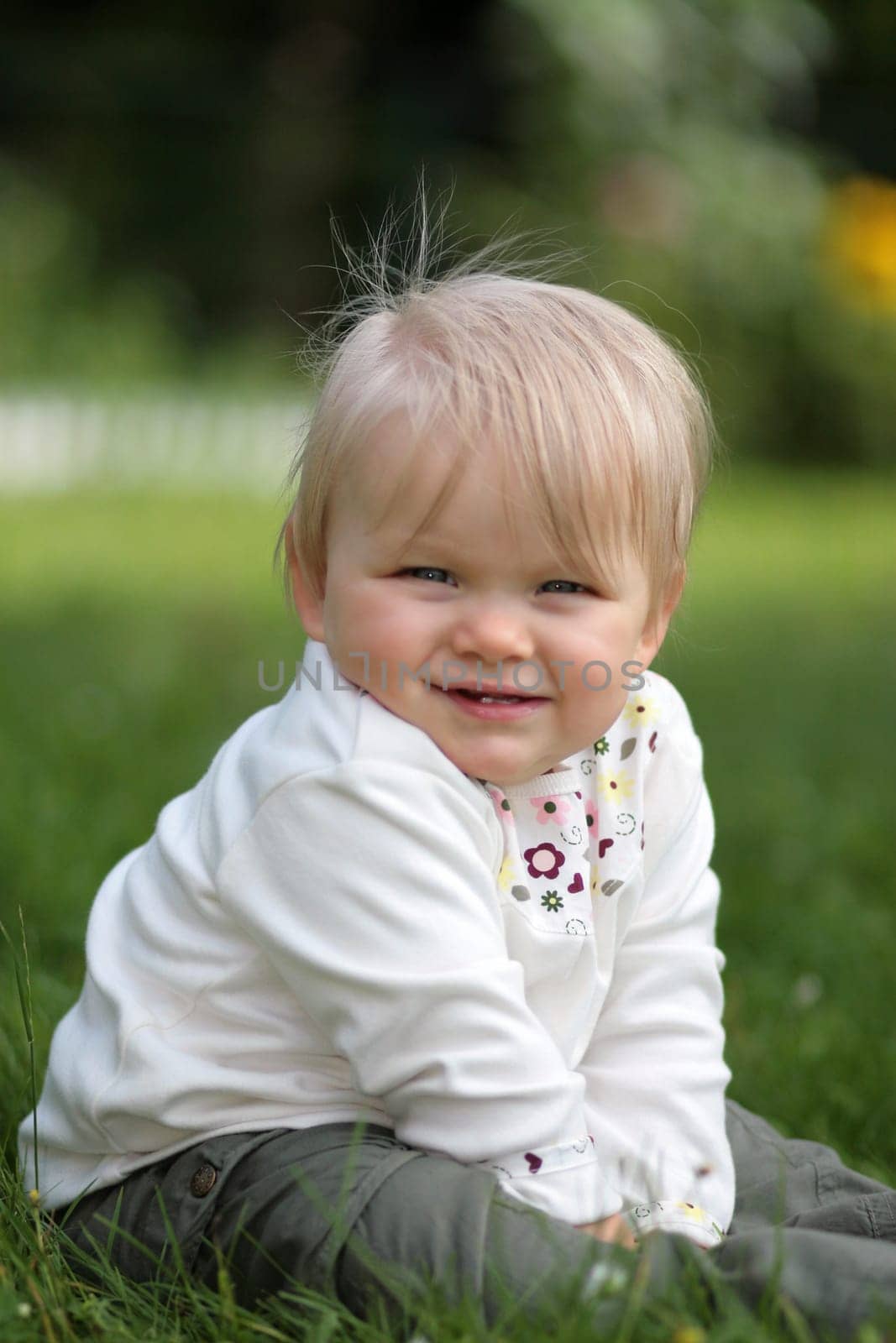 Baby posing on the meadow