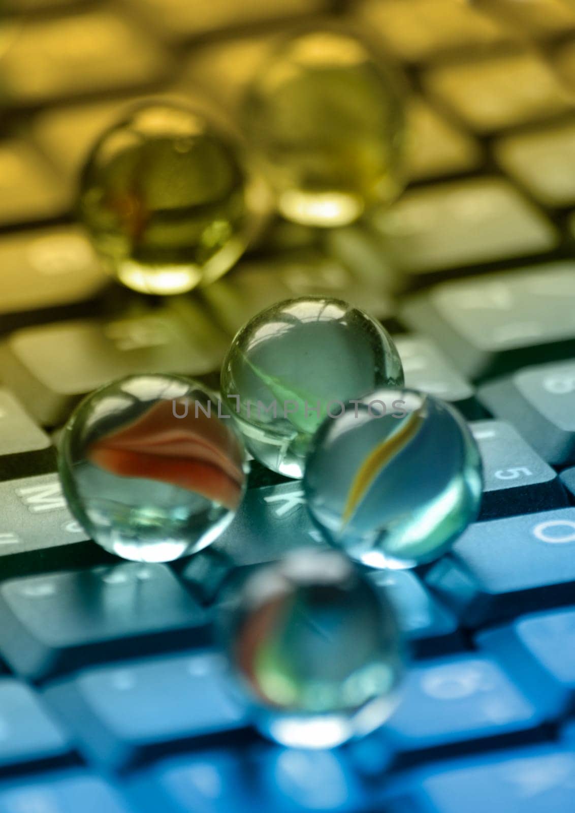Marbles on notebook keyboard