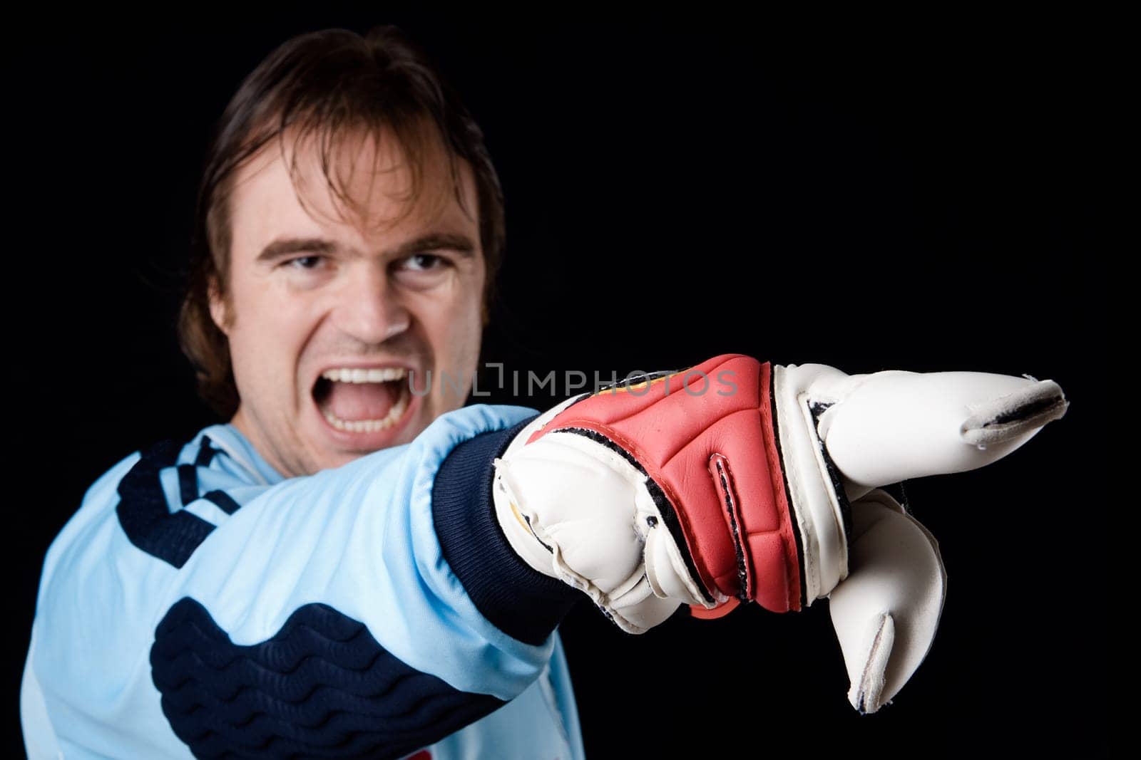Goalkeeper reprimands players
