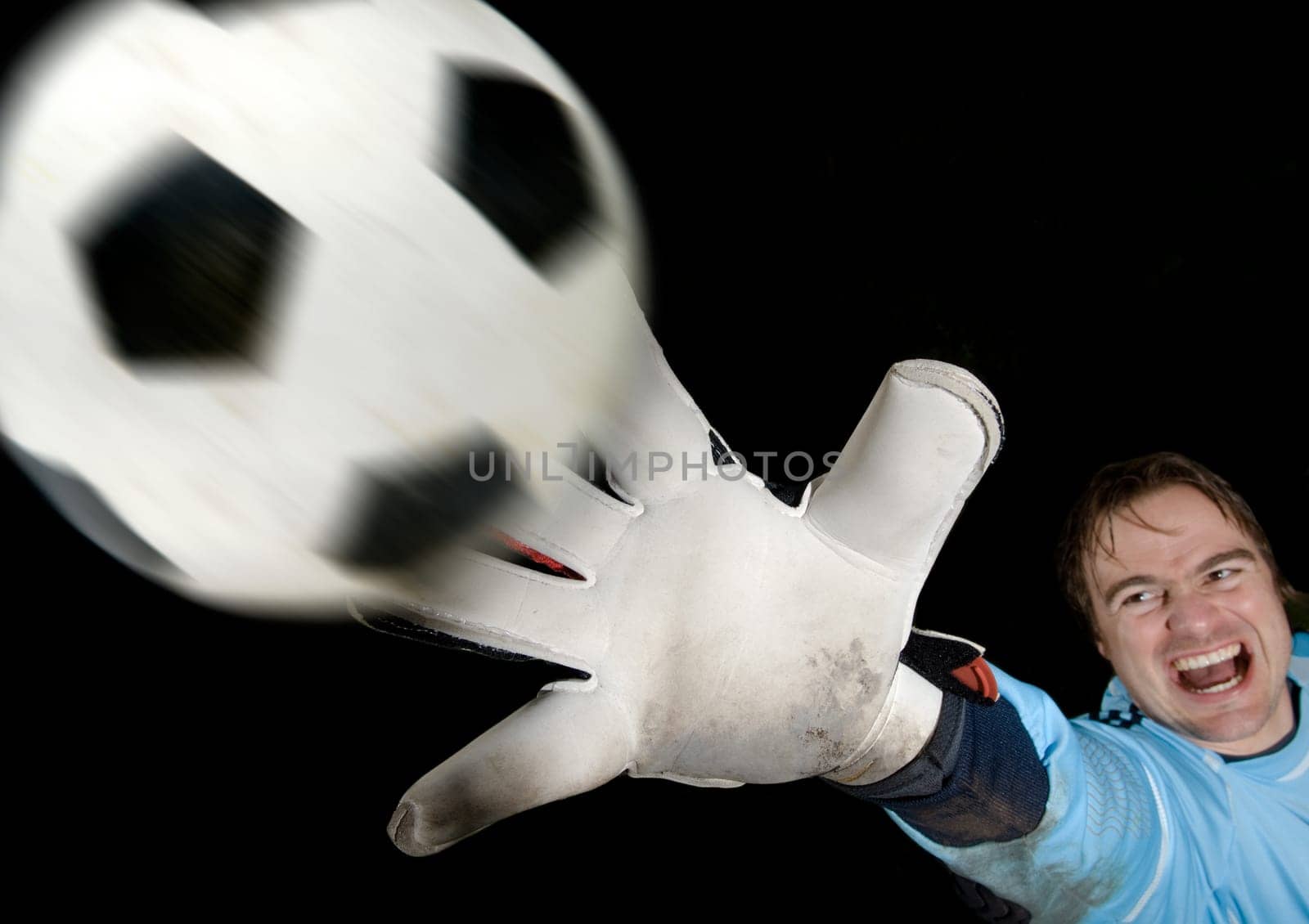 Goalkeeper intercepts ball