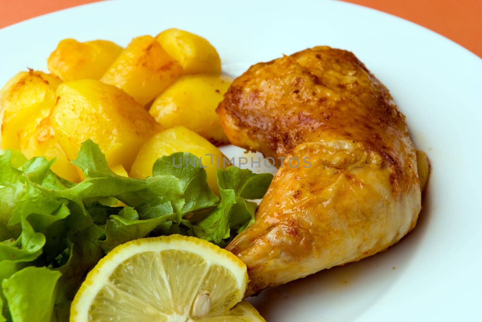 Fried chicken leg with salad