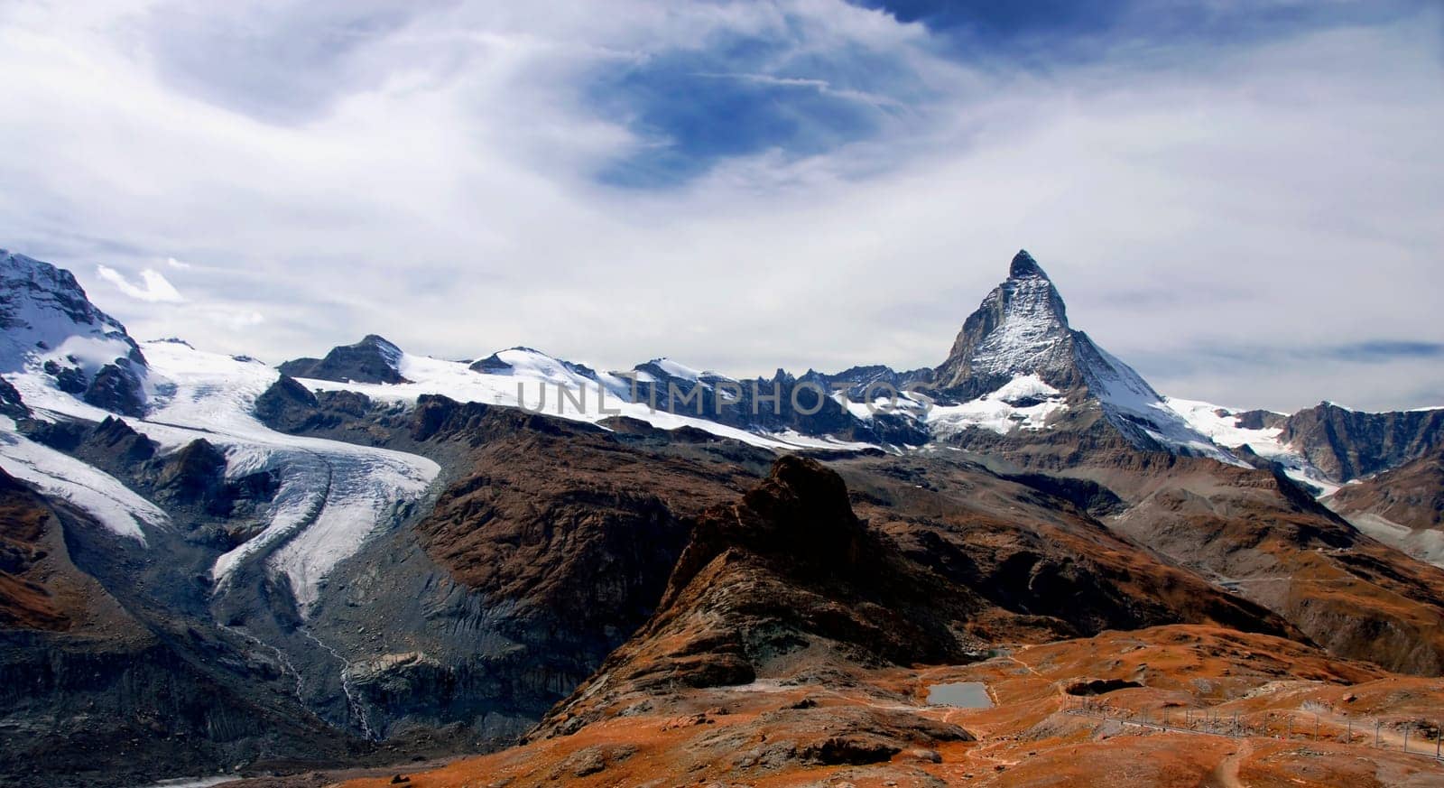 The name Theodul Glacier refers to two contiguous glaciers in the Valais Alps south of Zermatt,in the canton of Valais,which belong to the Gorner Glacier system. The Theodul Glacier has its source on the western and southwestern flanks of the Brei