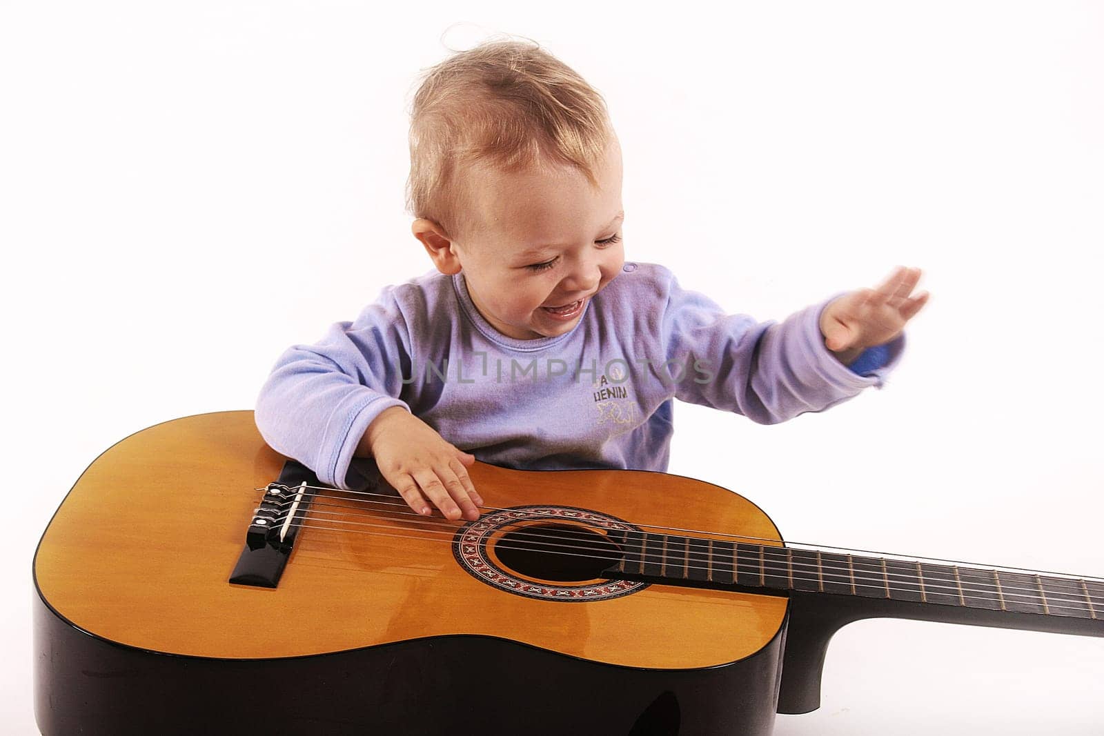 Child makes music