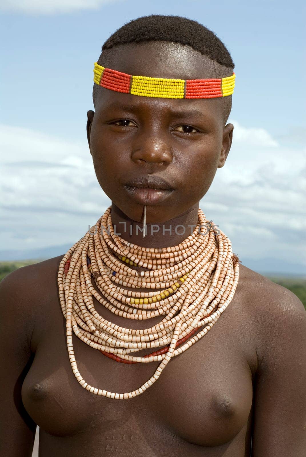Portrait of a girl of the Karo tribe in southern Ethiopia.