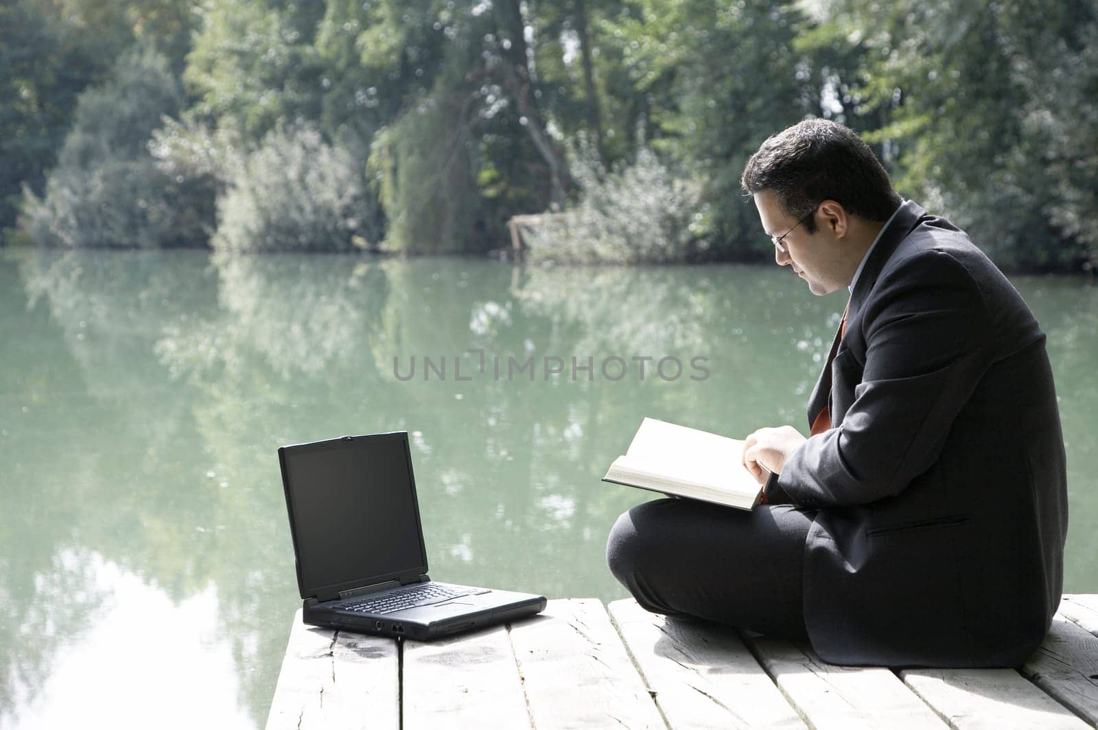 Reading by the lake