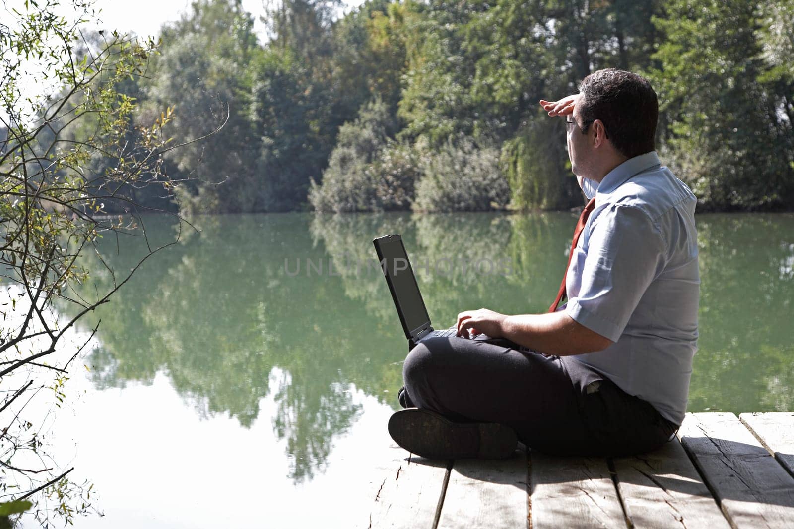 Businessman by the lake