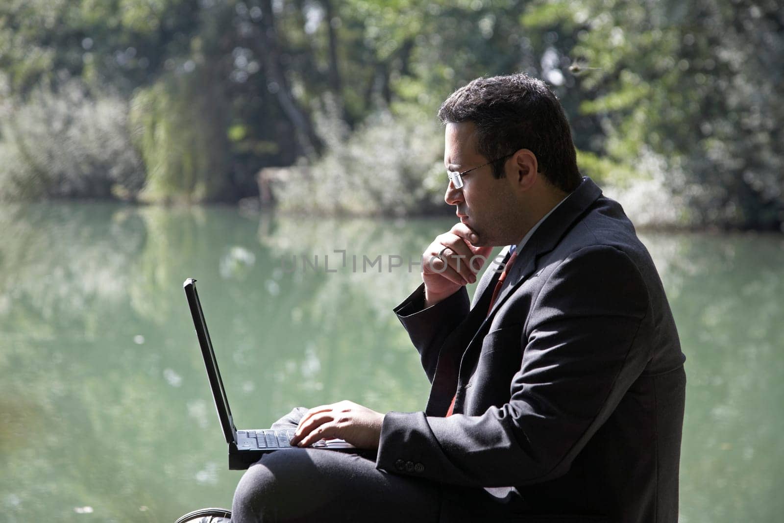 Businessman by the lake