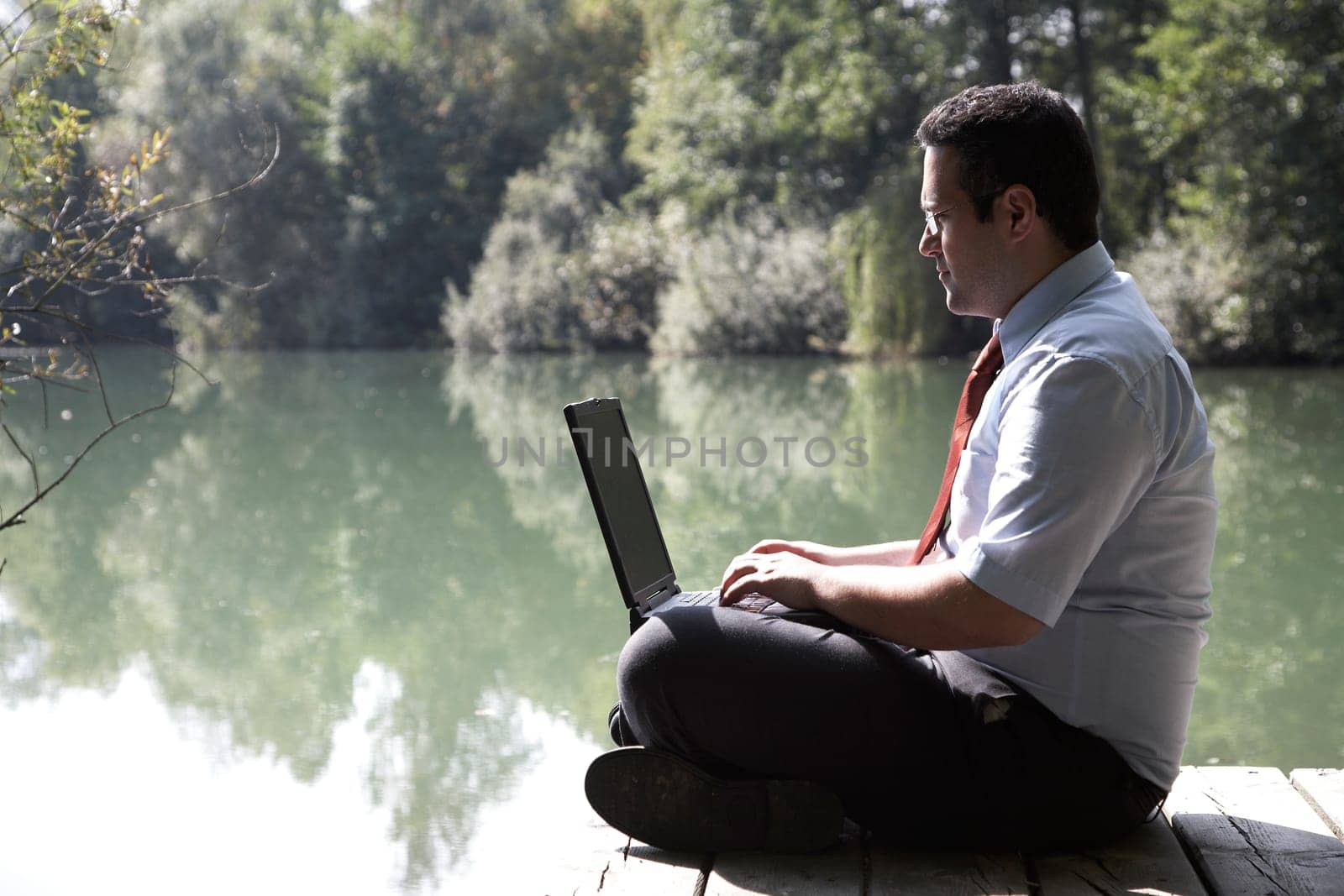 Businessman by the lake