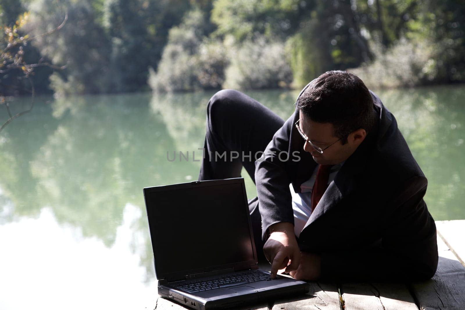 Businessman by the lake