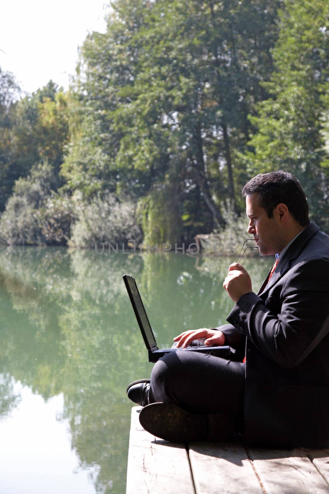 Businessman by the lake