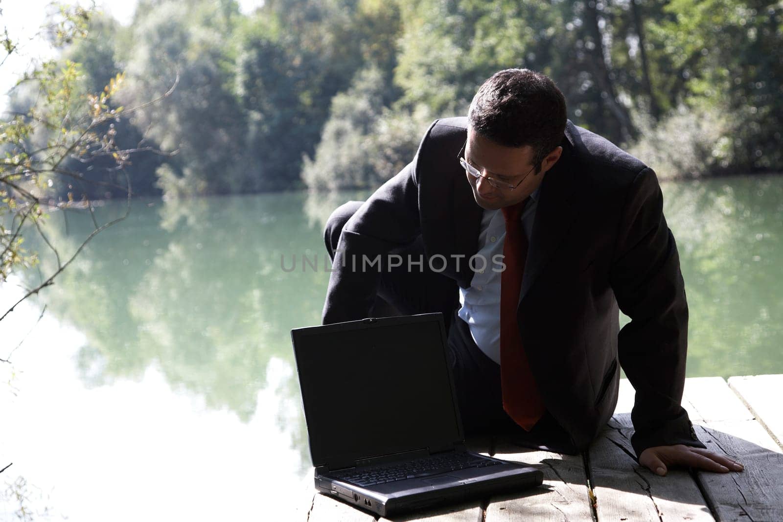 Businessman by the lake