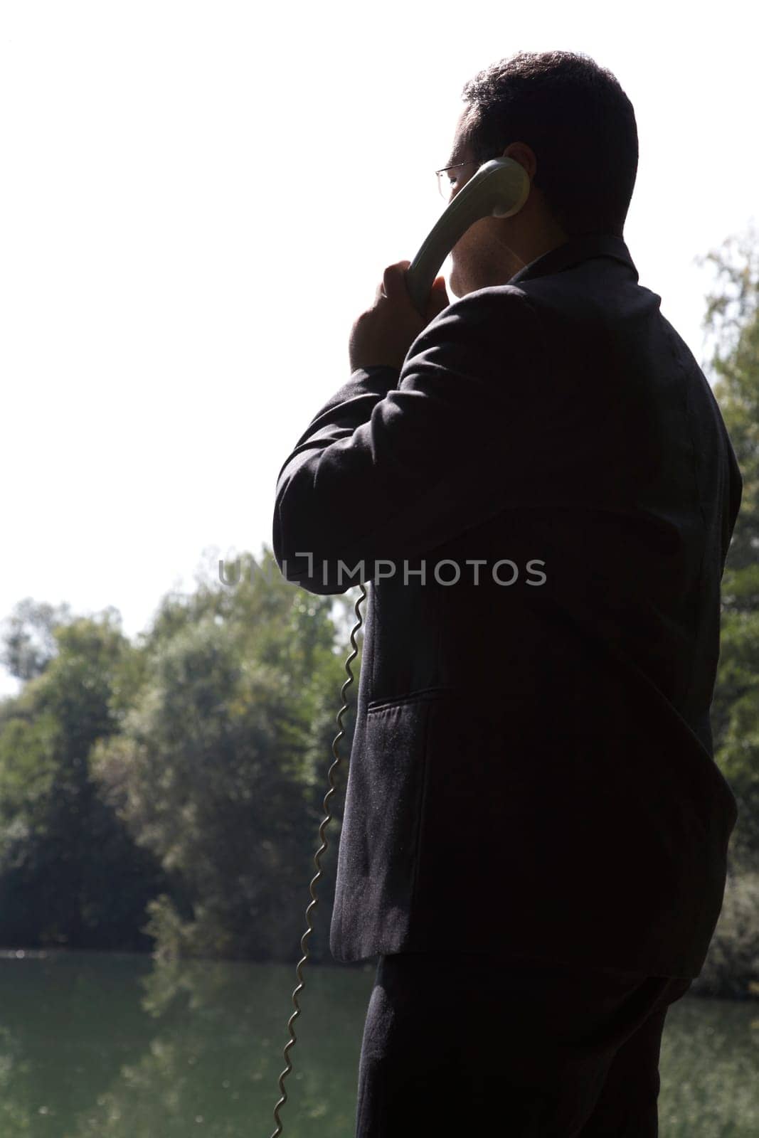 Businessman by the lake