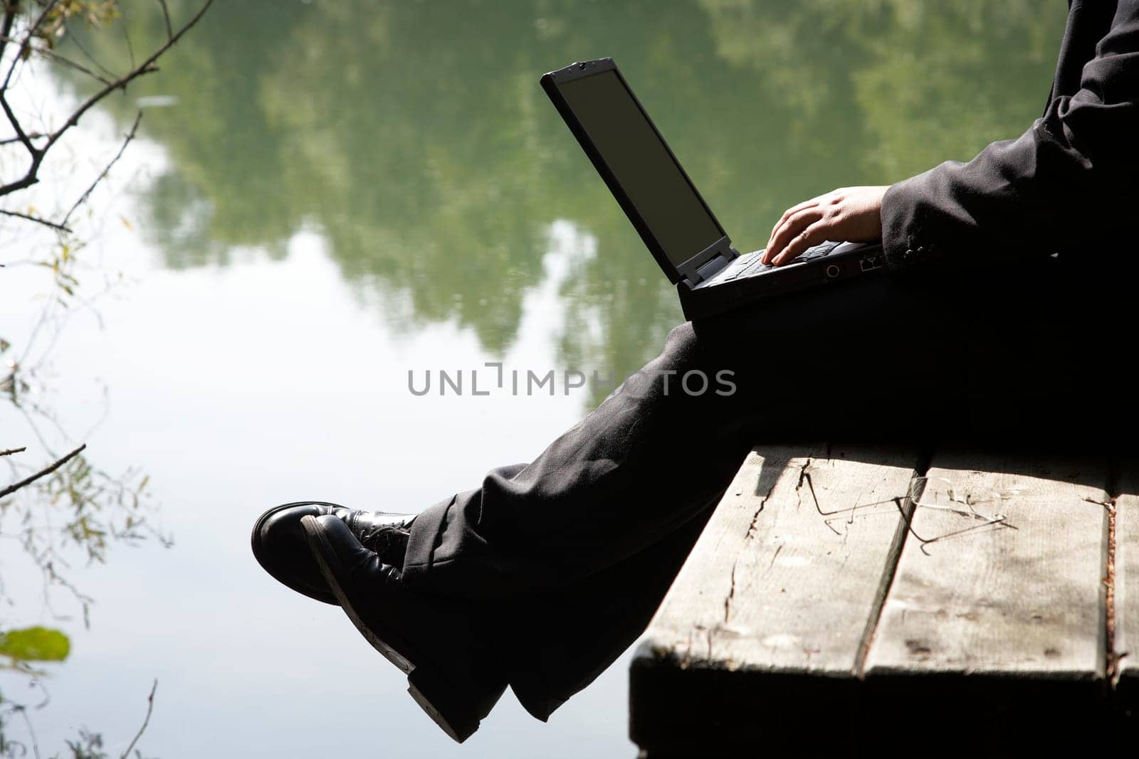 Businessman by the lake