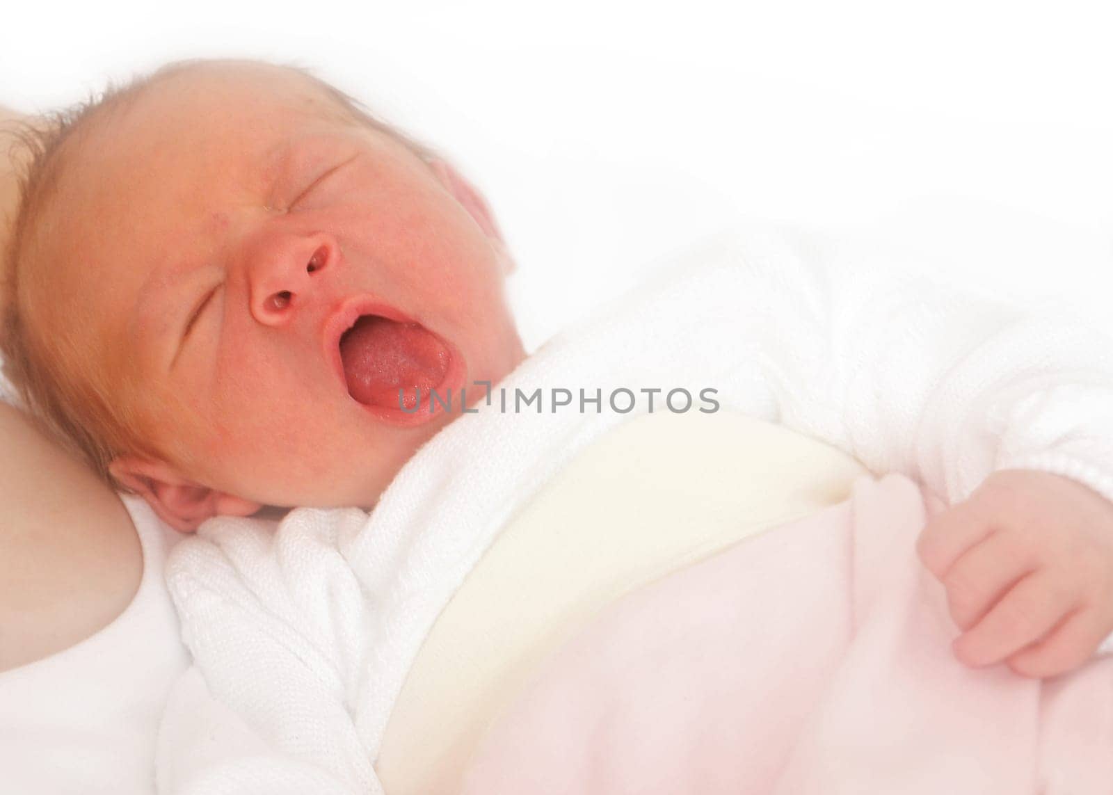 Yawning newborn baby